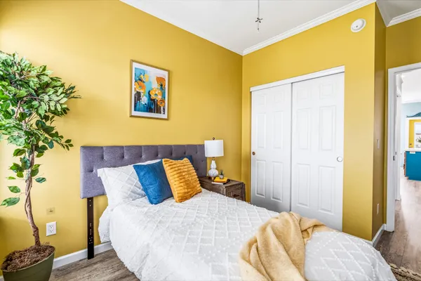 a bathroom with a sink a toilet and a shower curtain