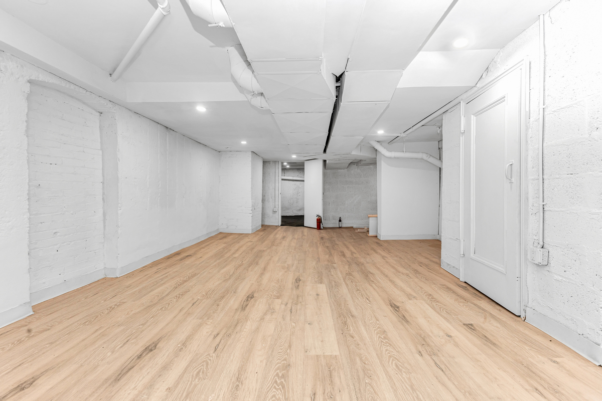 1050 Sterling Place Brooklyn, NY 11213 - Photo 16 of 23 a view of empty room with wooden floor