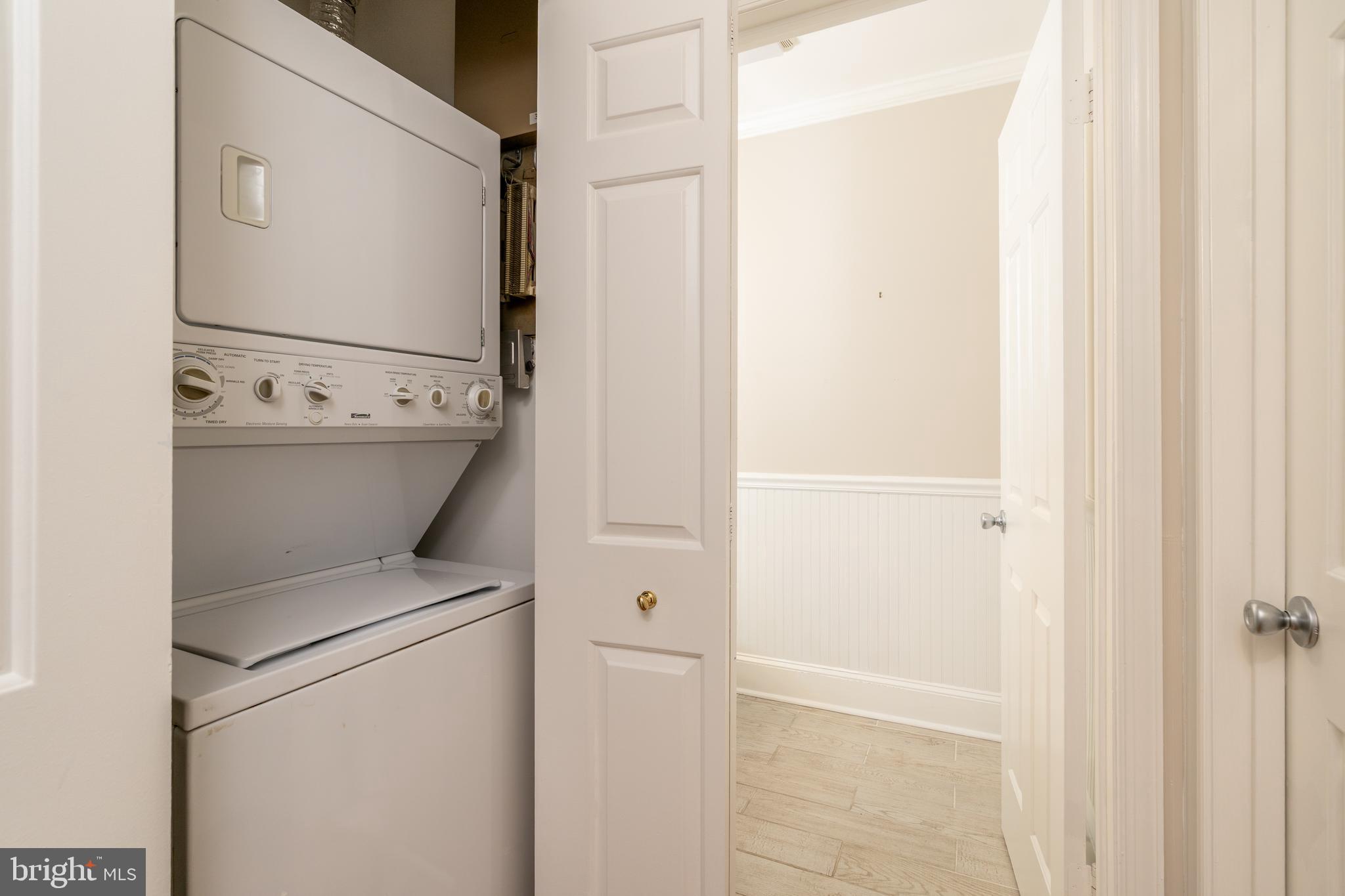 3299 Sutton Place Northwest, Unit C Washington, DC 20016 - Photo 31 of 41 a utility room with dryer and washer