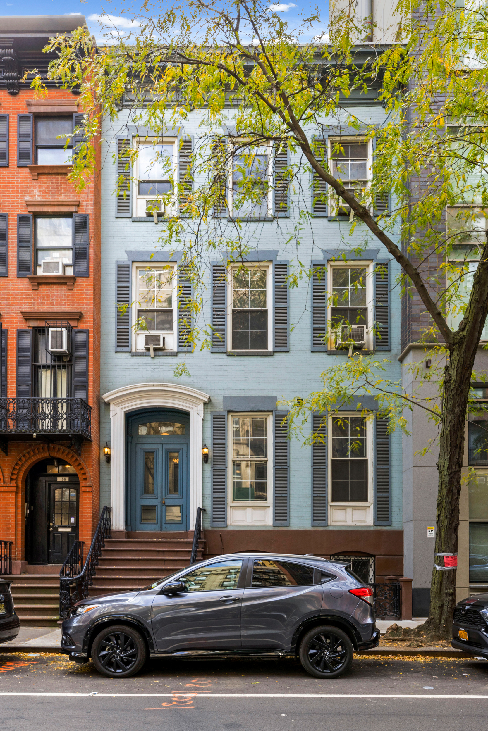 136 East 30th Street, Unit DUPLEX Manhattan, NY 10016 - Photo 25 of 26 a car parked in front of a building