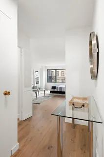 a view of a living room and hardwood floor