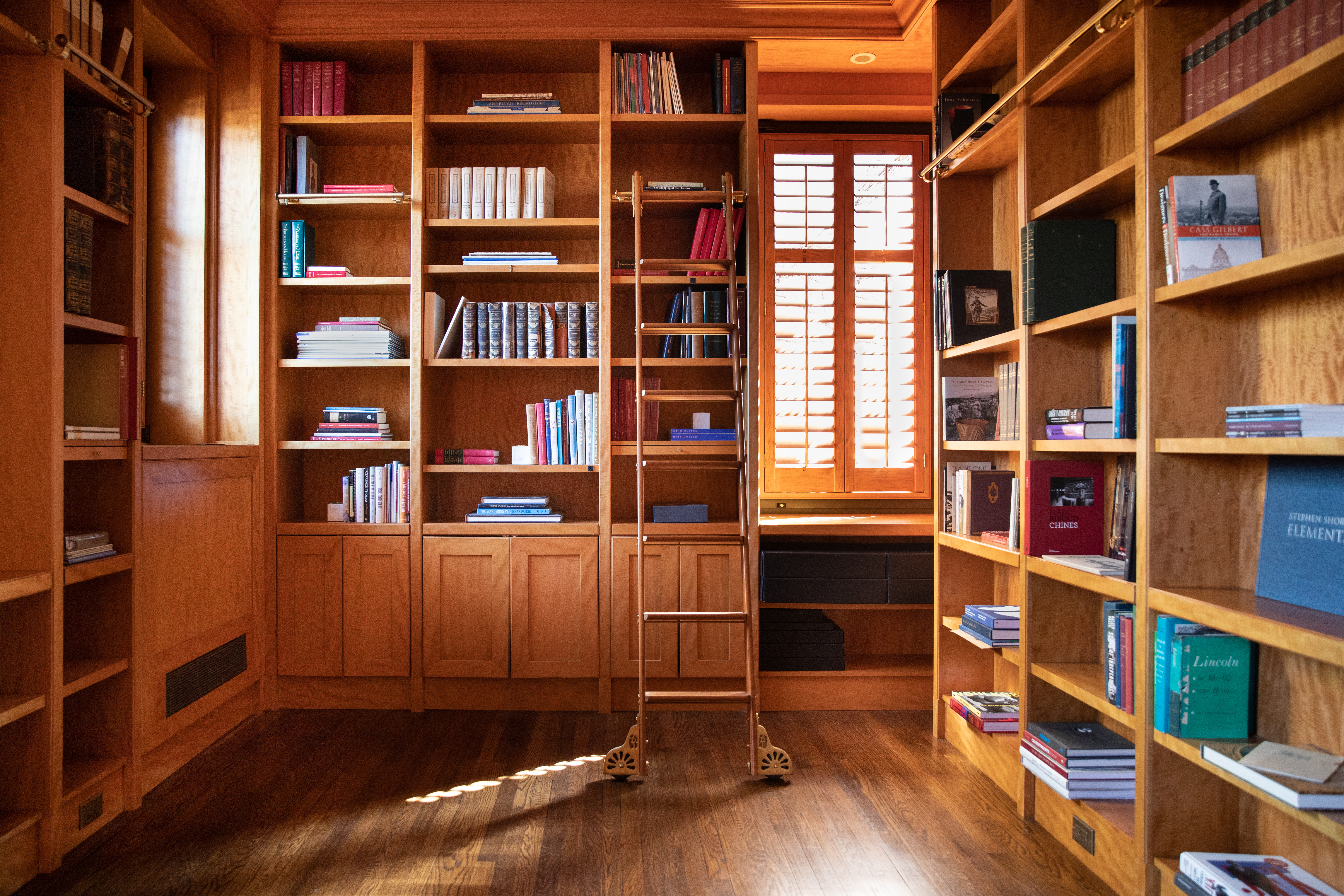 1070 Park Avenue, Unit PHE Manhattan, NY 10128 - Photo 8 of 14 a view of a room with cabinets and wooden floor