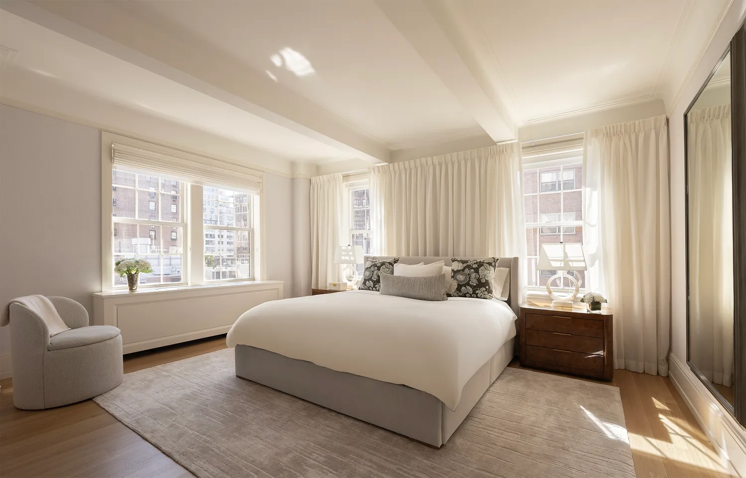 a bedroom with a bed and a couch