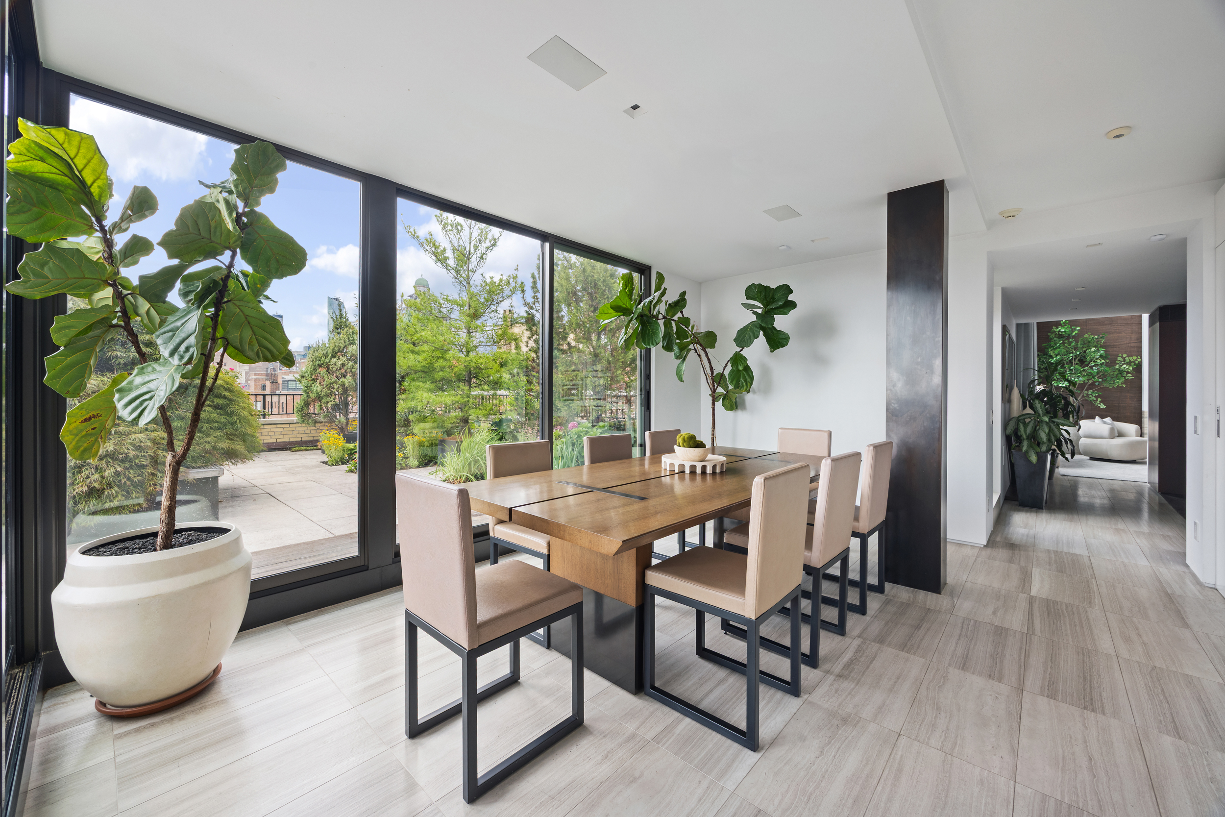24 5th Avenue, Unit PH1701 Manhattan, NY 10011 - Photo 7 of 24 a dining room with furniture and window