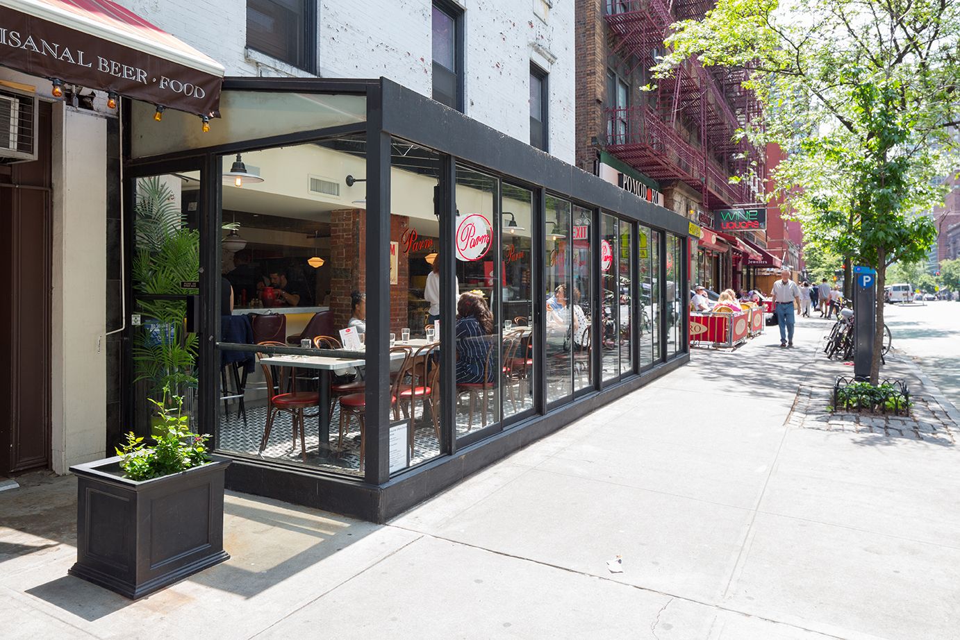 a view of a building with sitting area