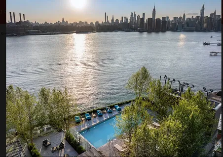 a view of outdoor space with wooden floor
