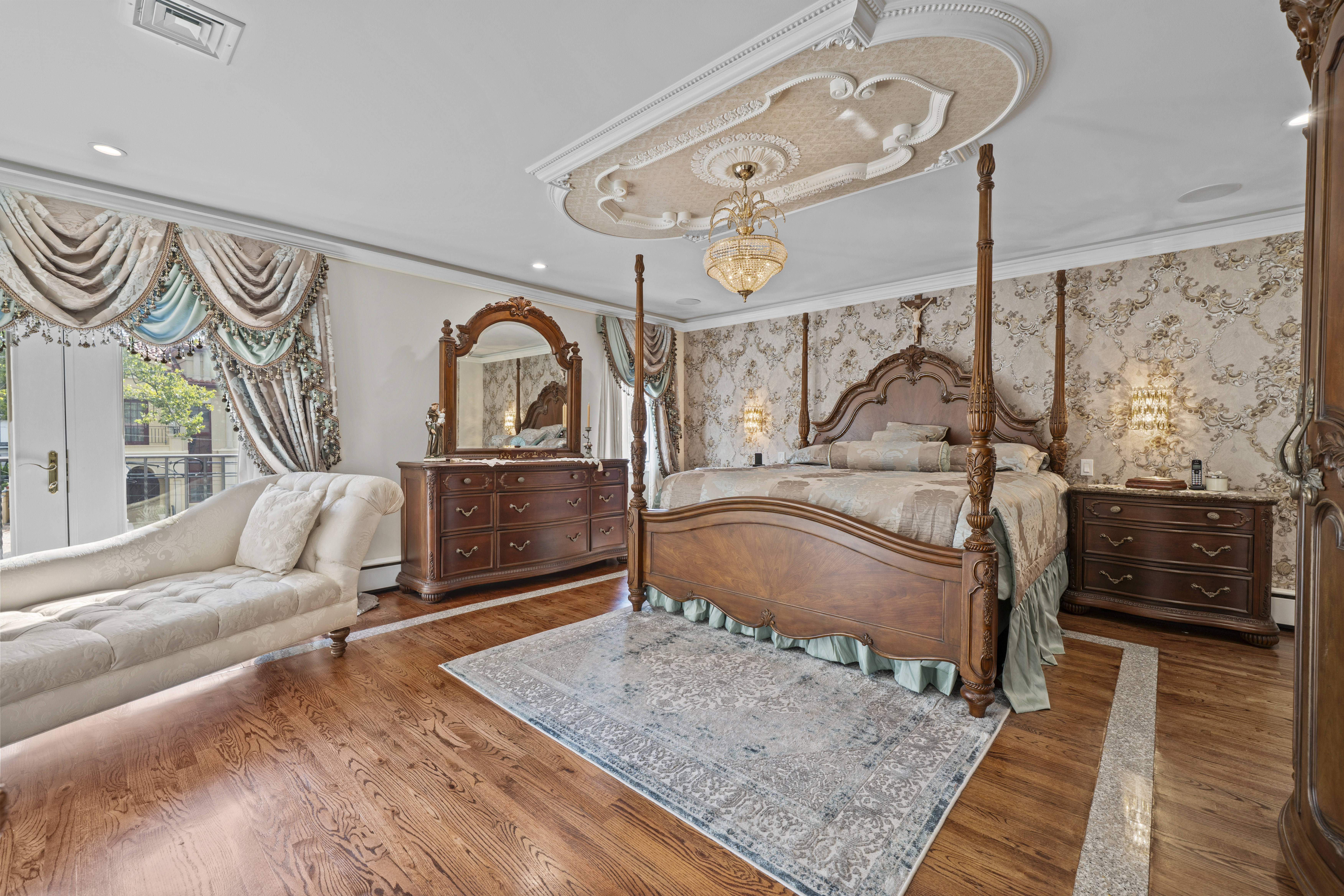 2253 East 64th Street Brooklyn, NY 11234 - Photo 20 of 45 a living room with furniture and a clock