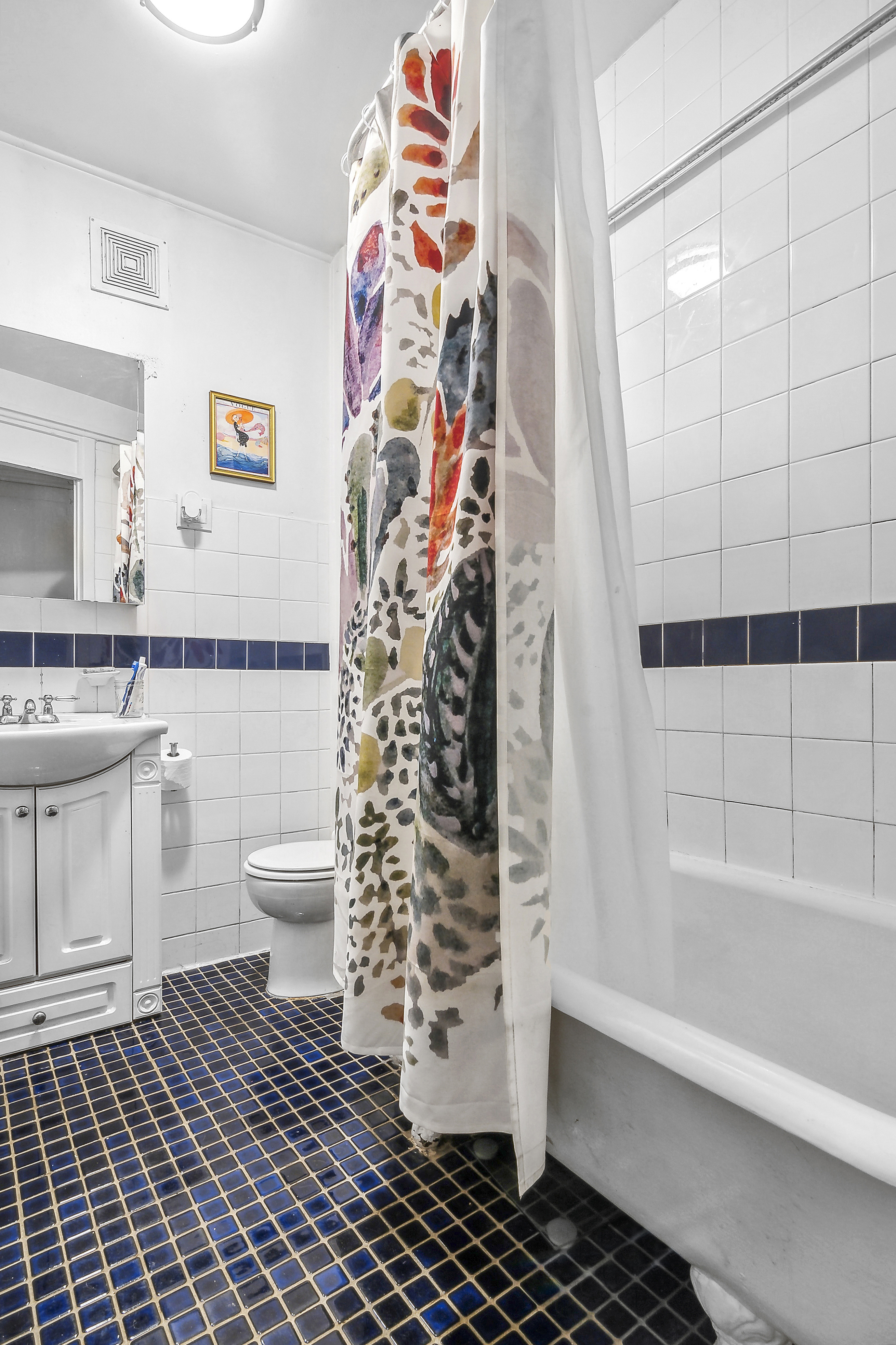 245 Baltic Street, Unit 1 Brooklyn, NY 11201 - Photo 6 of 7 a bathroom with a toilet and a shower