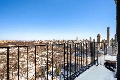 a view of a balcony with city view