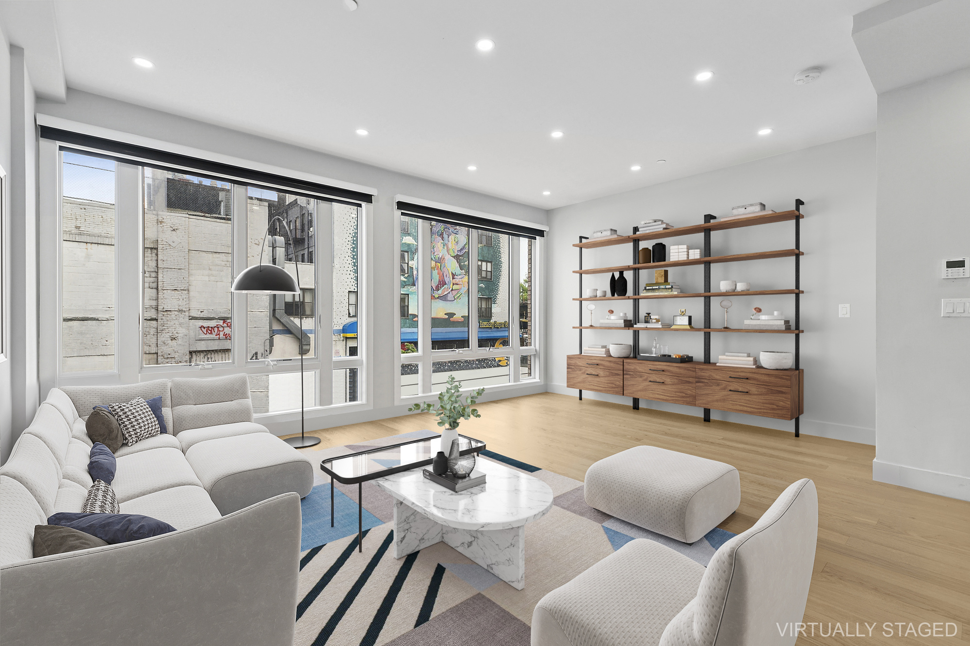 483 Hart Street, Unit 1 Brooklyn, NY 11221 - Photo 6 of 18 a living room with furniture and a large window