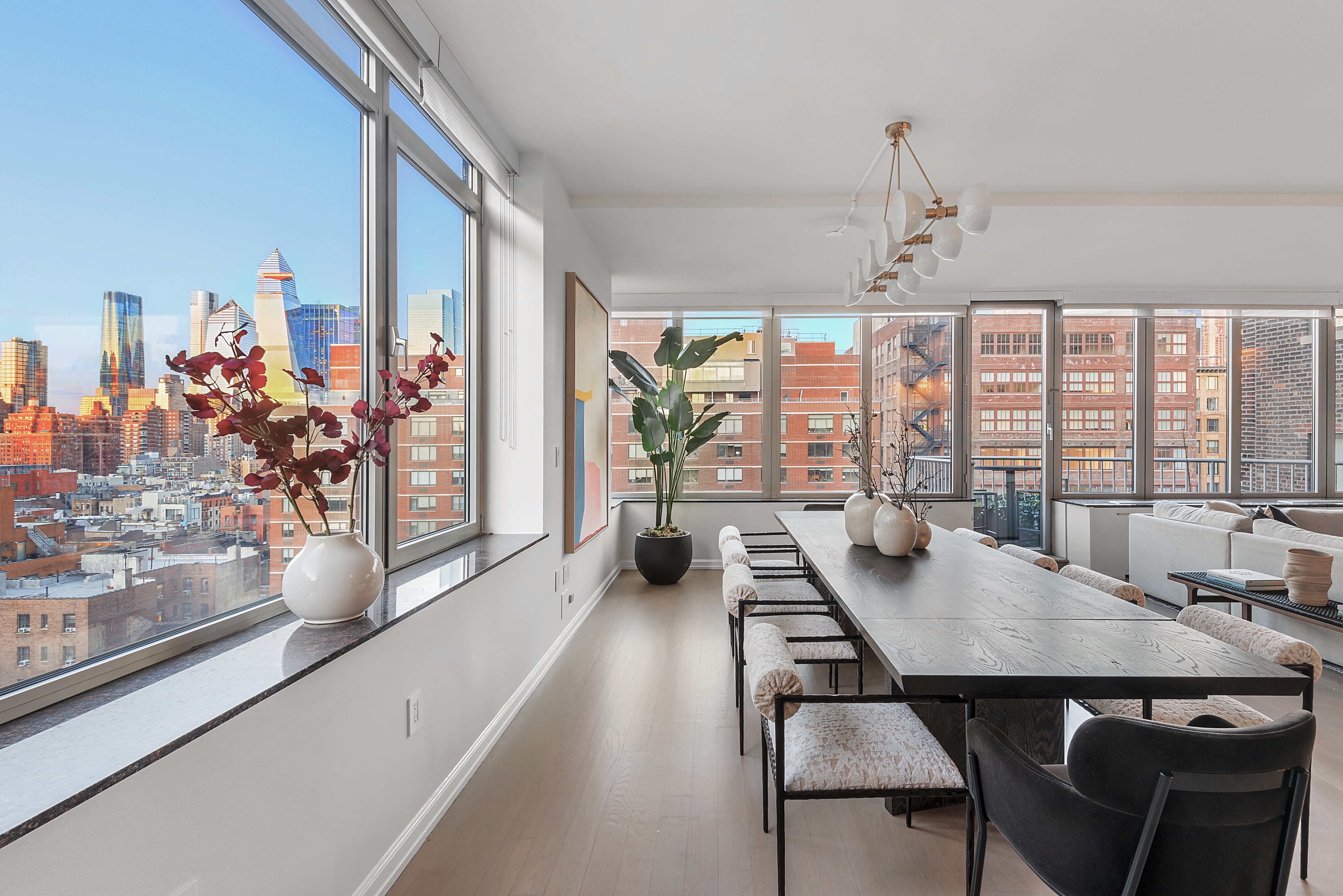 224 West 18th Street, Unit PHA Manhattan, NY 10011 - Photo 8 of 24 a view of a dining room with furniture window and outside view