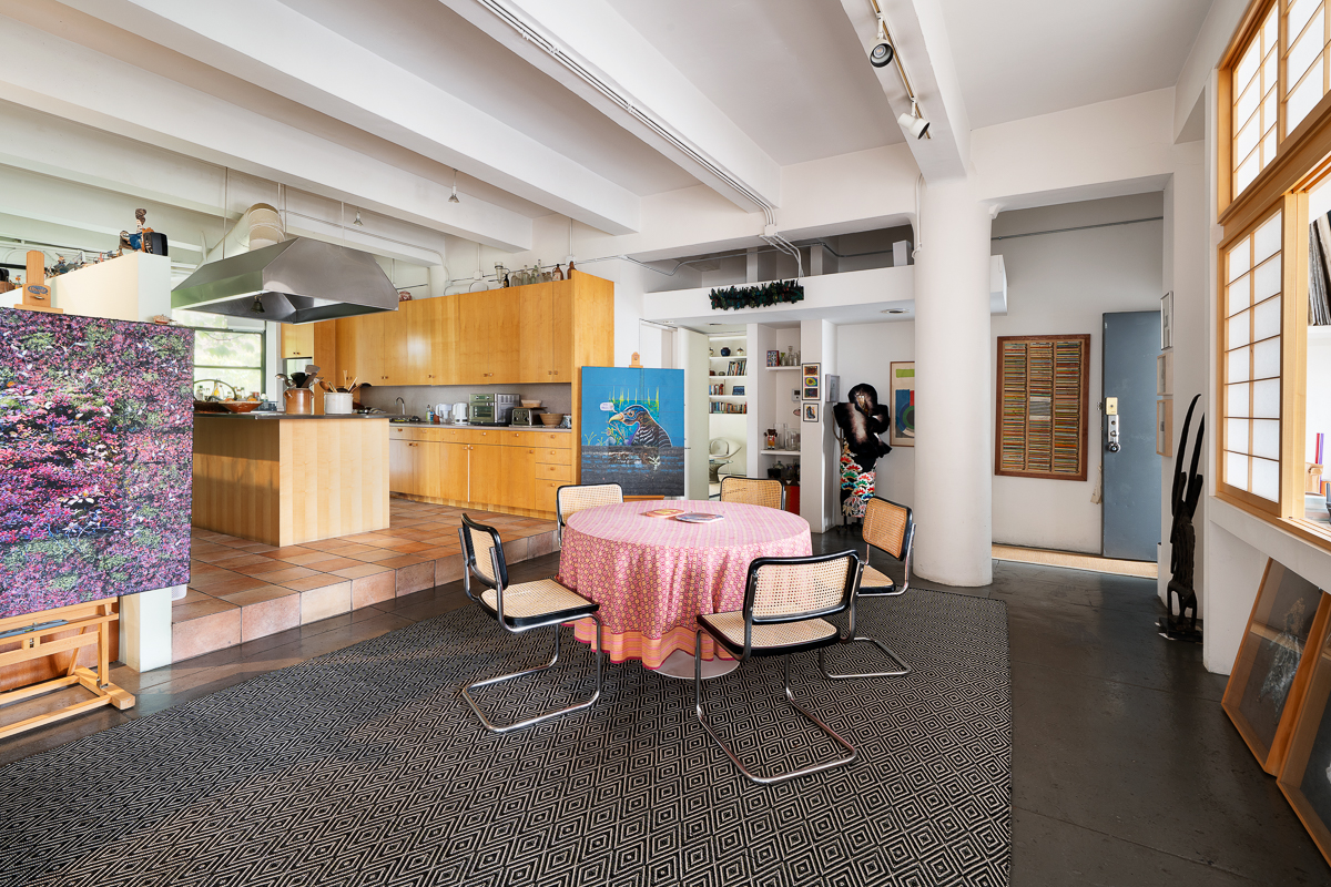 477 Washington Street Manhattan, NY 10013 - Photo 15 of 20 a bed room with a bed and wooden floor