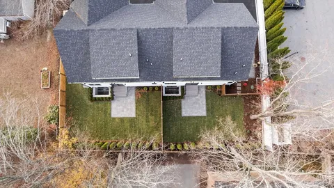 an aerial view of residential house with outdoor space