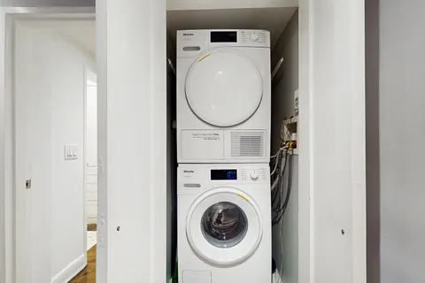 a bathroom with a toilet and a sink