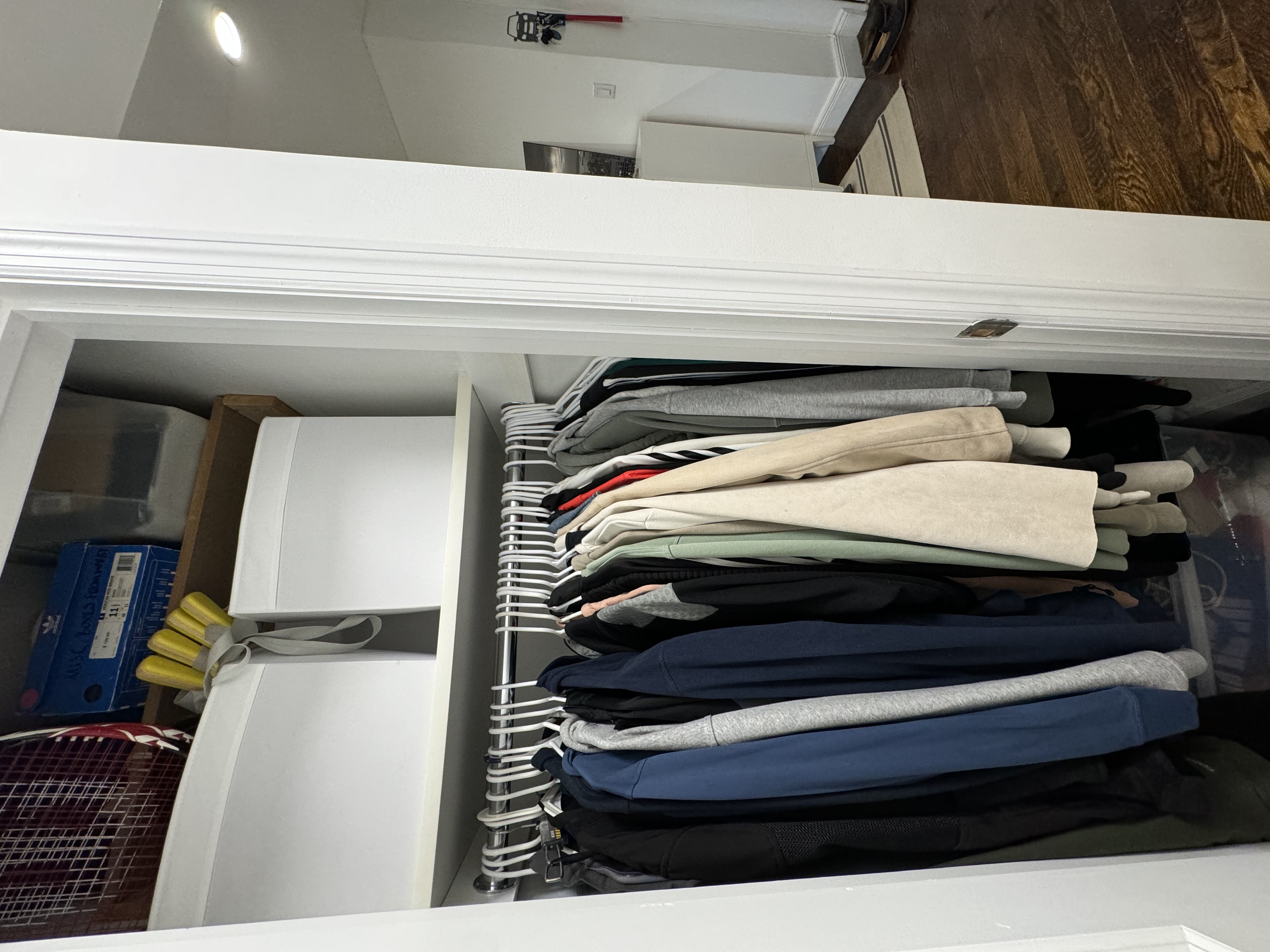 310 Lenox Road, Unit 4D Brooklyn, NY 11226 - Photo 9 of 14 a view of walk in closet with clothes and shoes