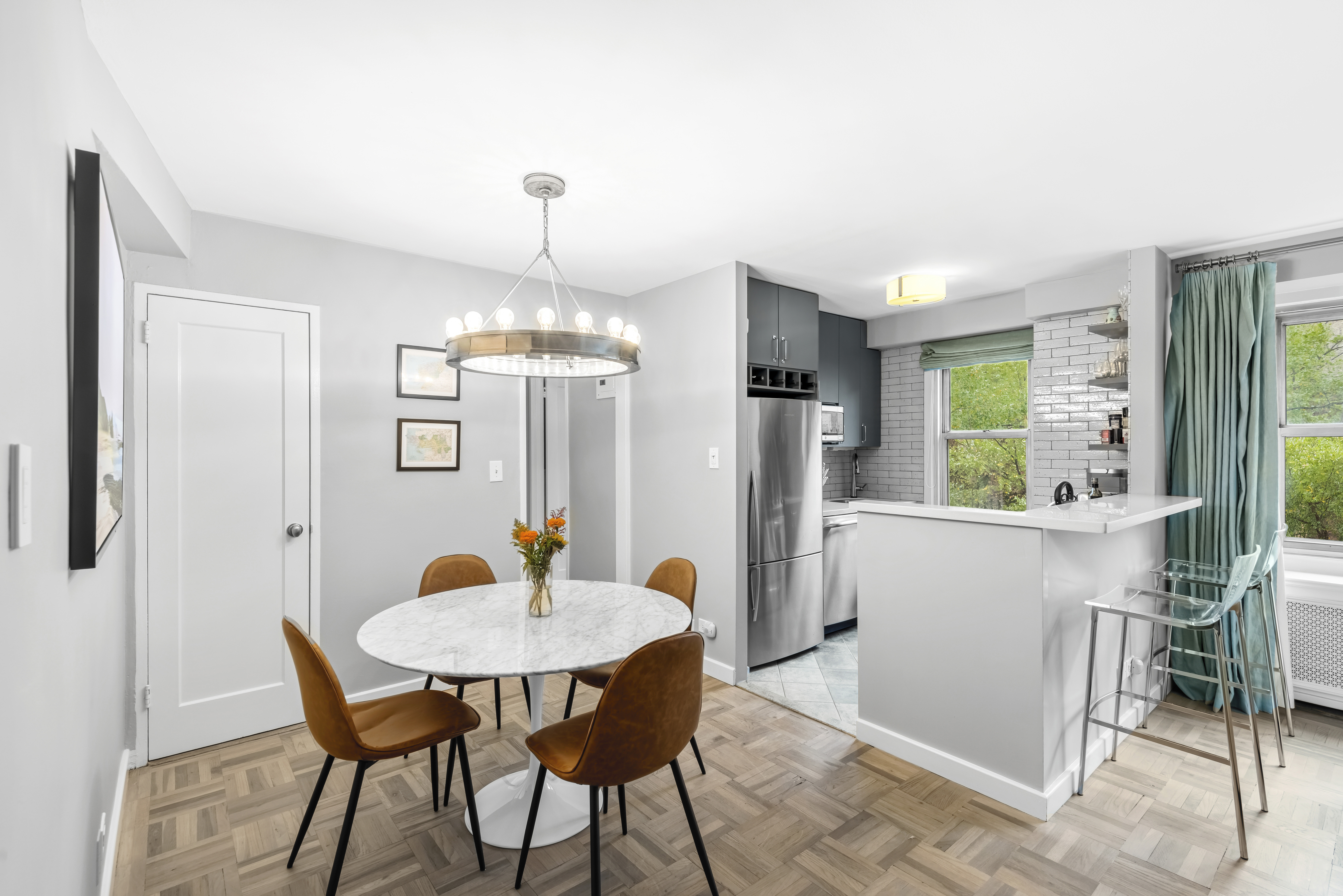 2 Charlton Street, Unit 5A Manhattan, NY 10014 - Photo 5 of 12 a dining room with furniture and window