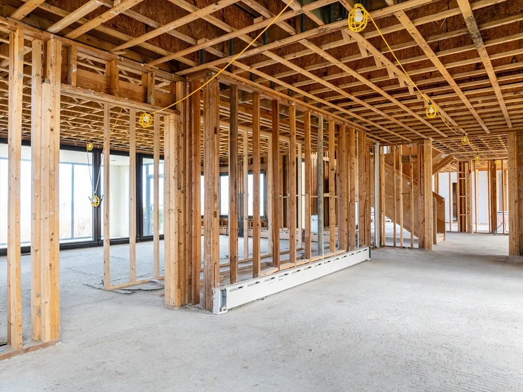 a view of a house with backyard and porch