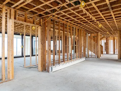 a view of a house with backyard and porch
