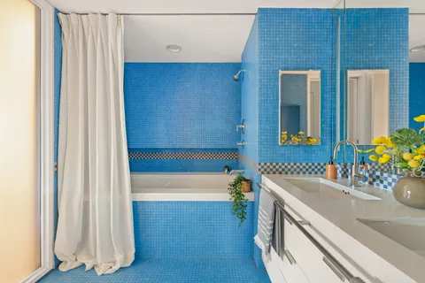 a bathroom with a sink and a bathtub