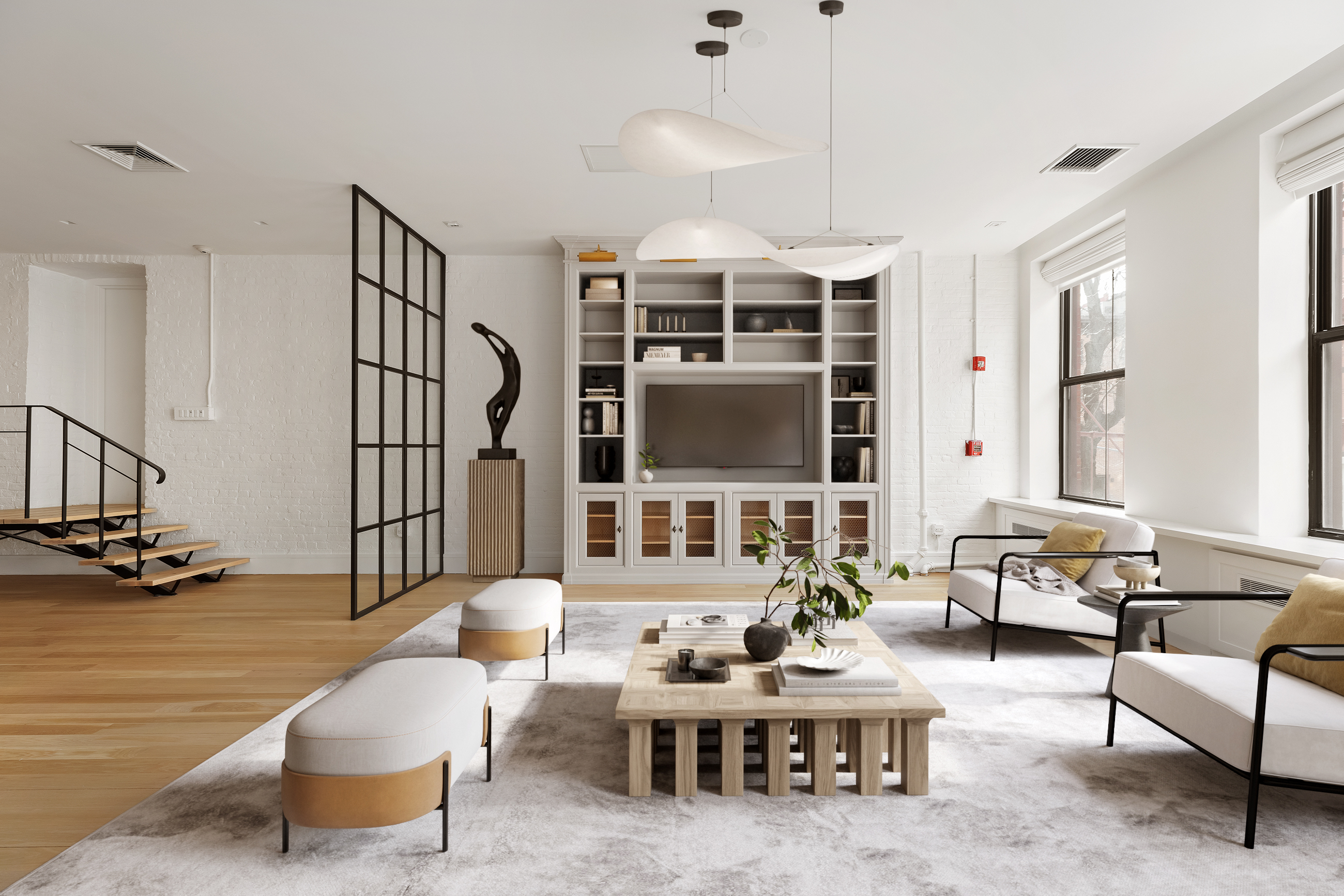 a living room with furniture and wooden floor