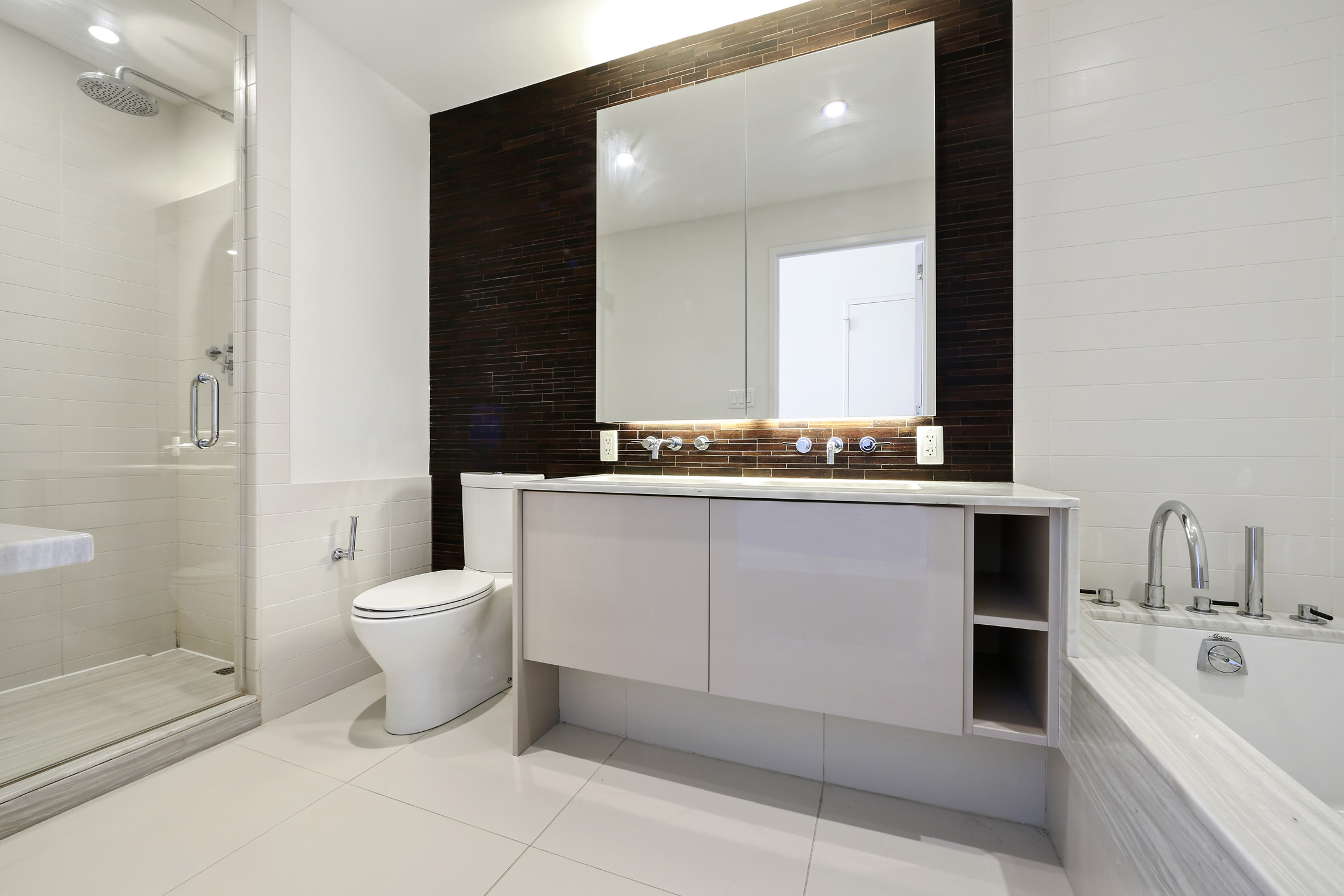 2 Northside Piers, Unit 31P Brooklyn, NY 11249 - Photo 7 of 16 a bathroom with a bathtub sink and toilet