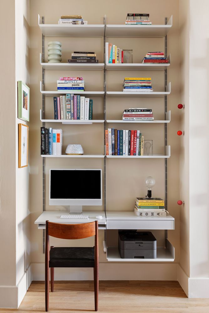 a room with bookshelf and a book shelf