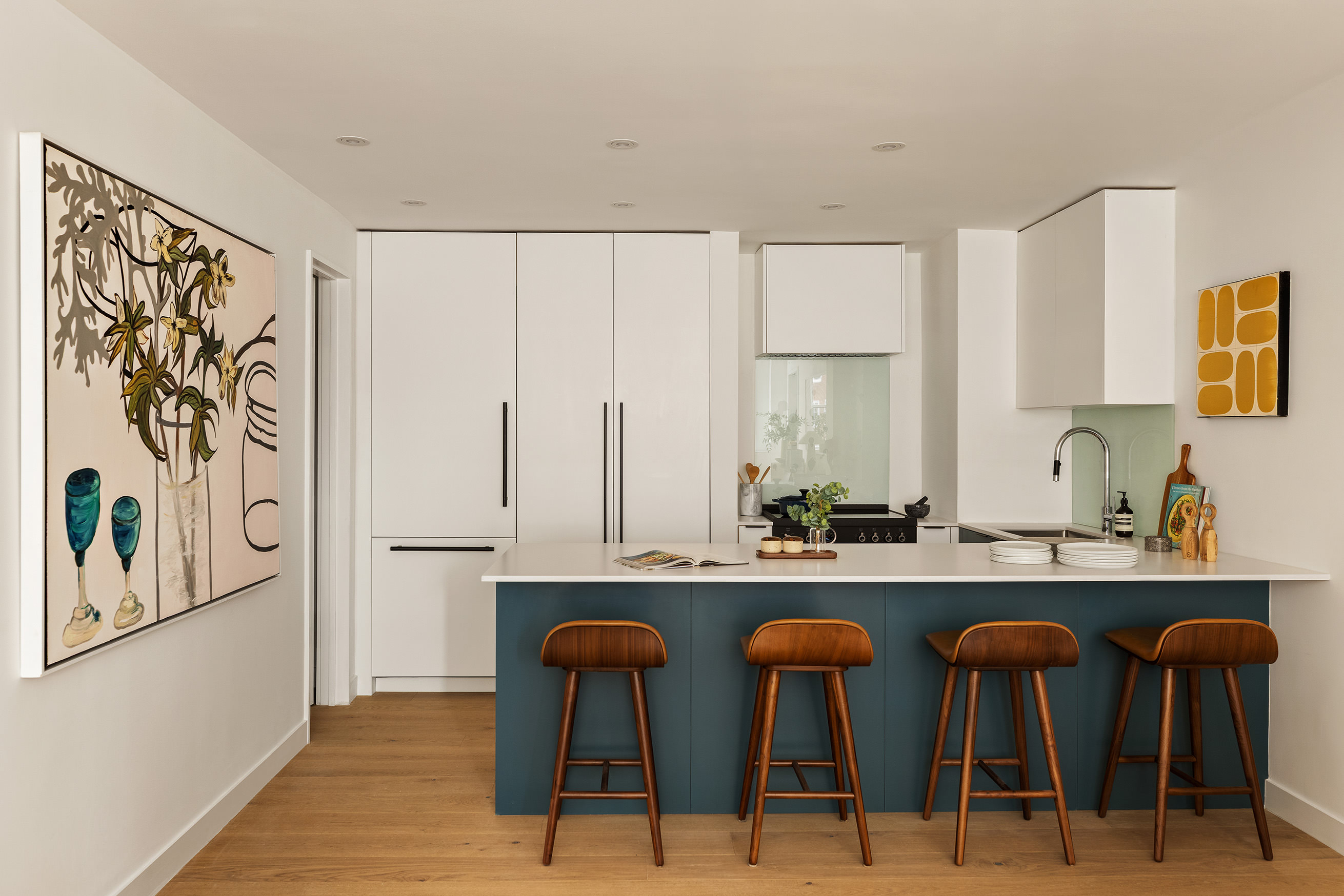 32 Gramercy Park South, Unit 8BD Manhattan, NY 10003 - Photo 4 of 20 a kitchen with stainless steel appliances a dining table chairs cabinets and wooden floor