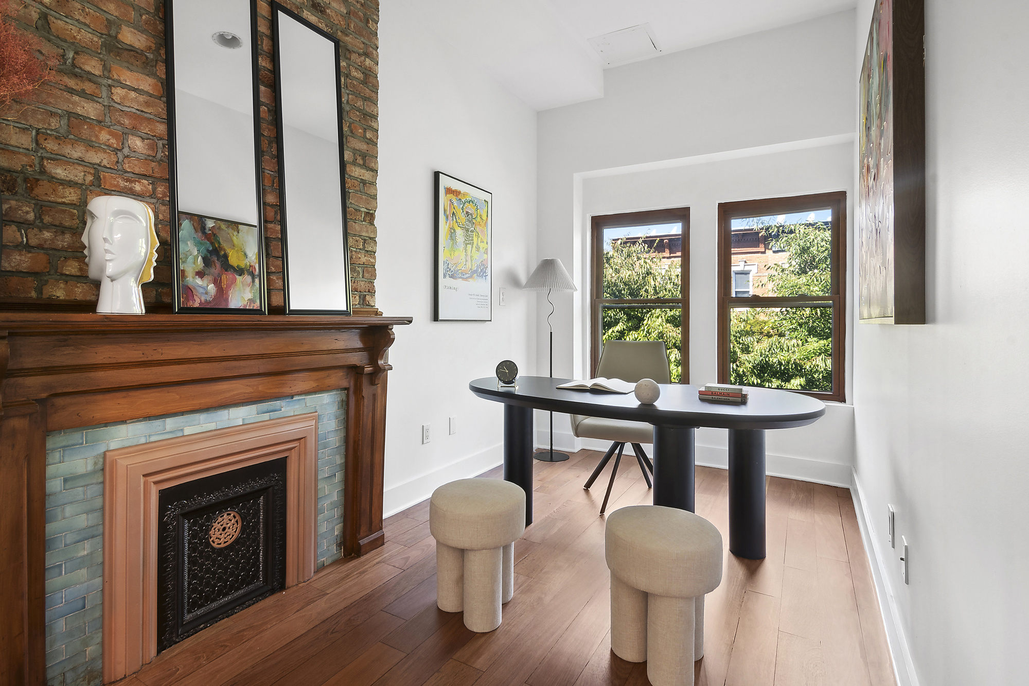 698 Halsey Street Brooklyn, NY 11233 - Photo 6 of 13 a view of a livingroom with furniture and a fireplace