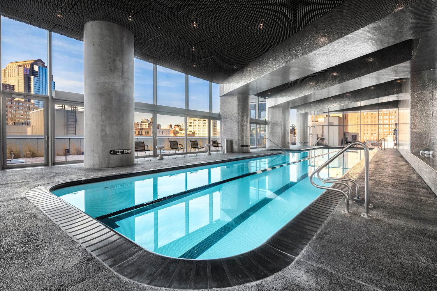 56 Leonard Street, Unit 12AEAST Manhattan, NY 10013 - Photo 7 of 11 a large swimming pool with view of living room