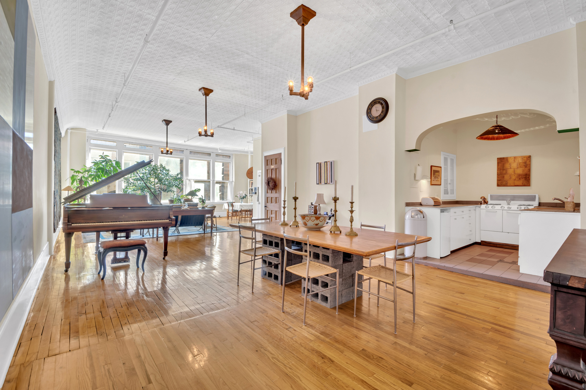 69 Wooster Street, Unit 3 Manhattan, NY 10012 - Photo 2 of 22 a view of a dining room with furniture and wooden floor
