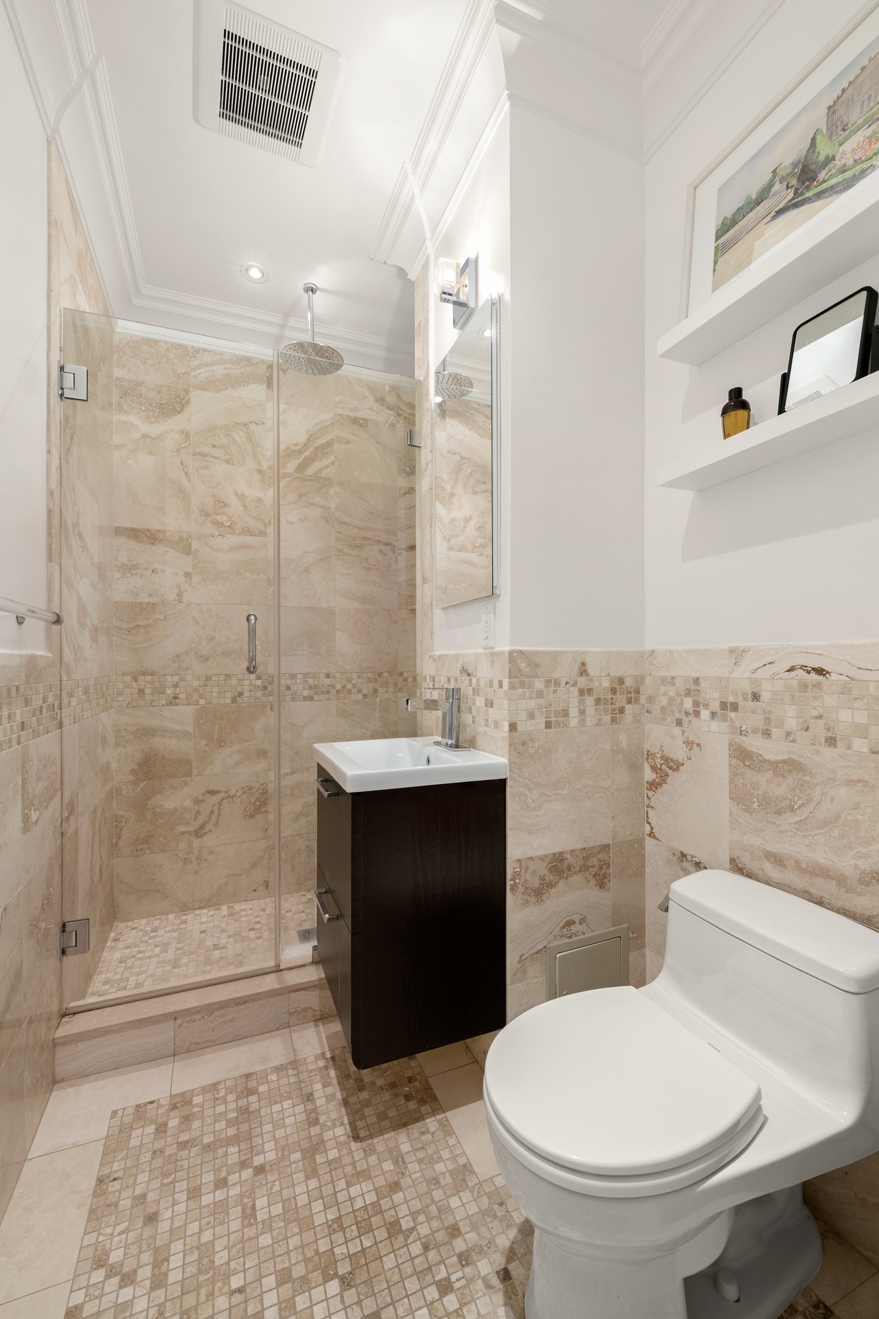 305 West 72nd Street, Unit 10A Manhattan, NY 10023 - Photo 9 of 12 a bathroom with a toilet a sink and a shower