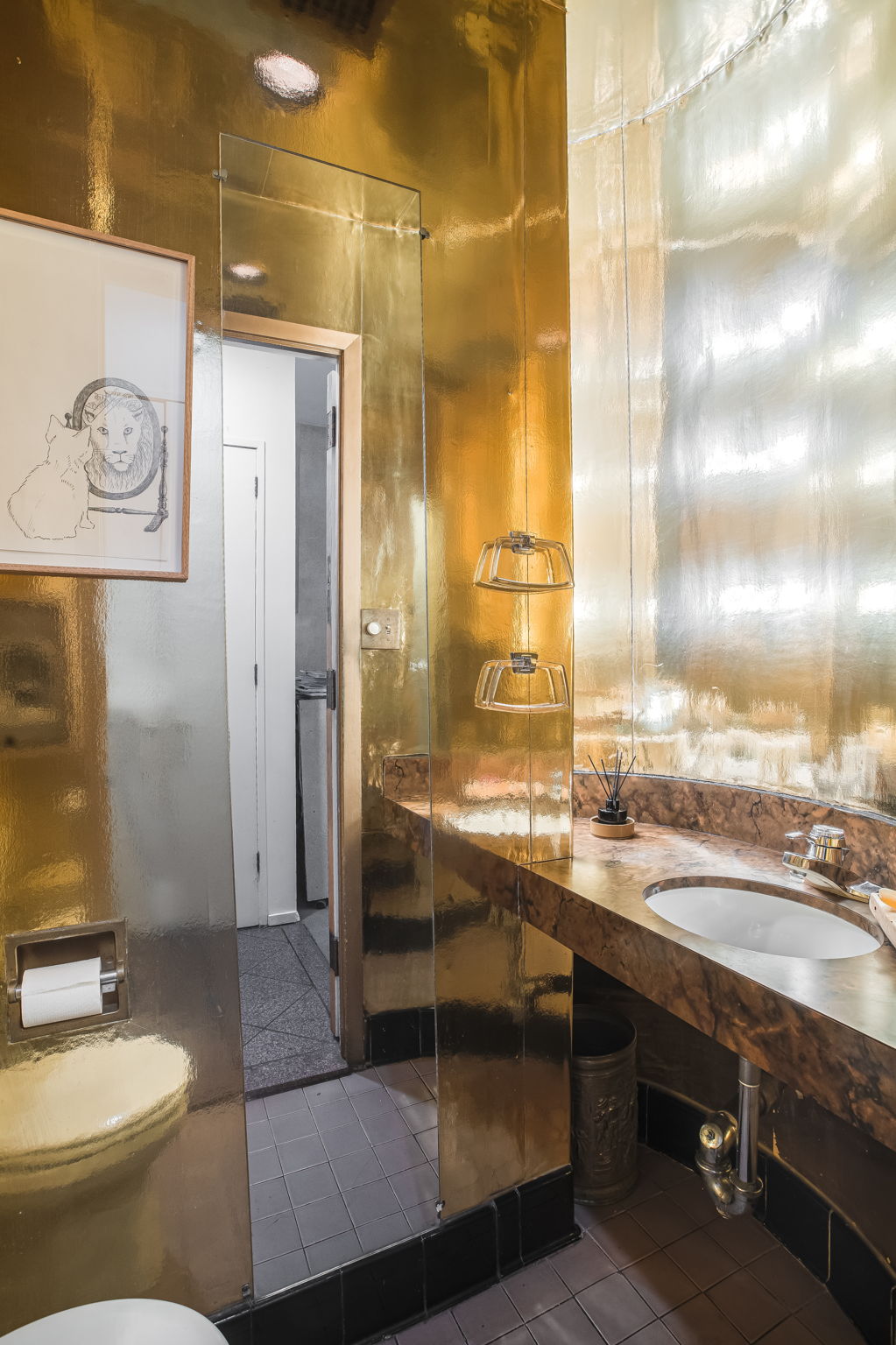 206 East 30th Street Manhattan, NY 10016 - Photo 9 of 21 a bathroom with a sink and a mirror