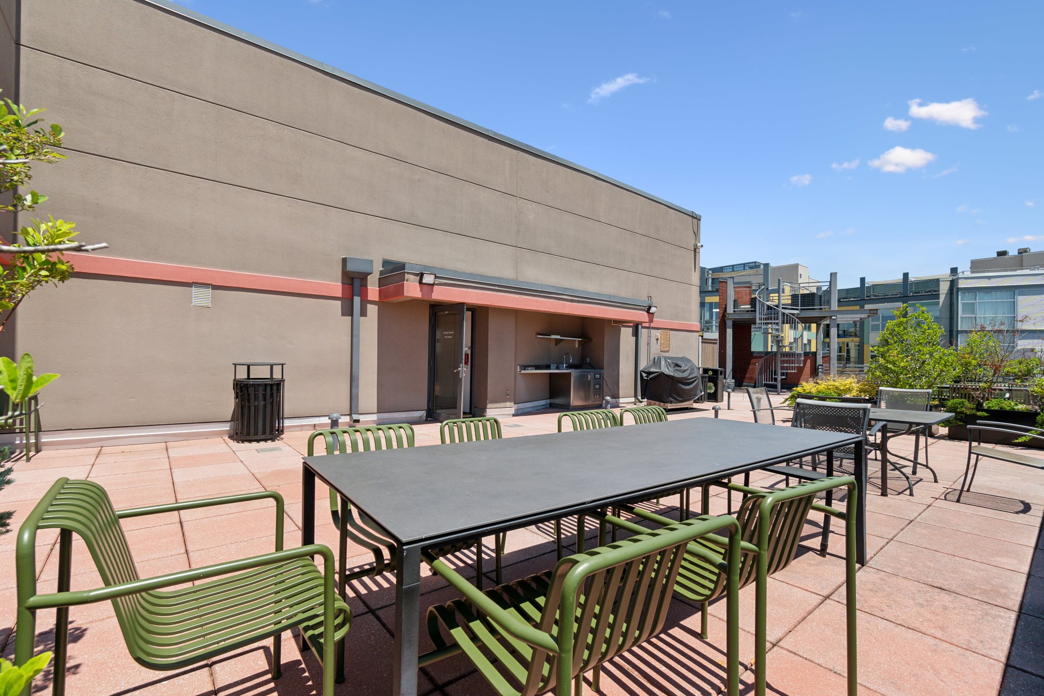 2120 Vermont Avenue Northwest, Unit 309 Washington, DC 20001 - Photo 24 of 26 a view of a patio with table and chairs