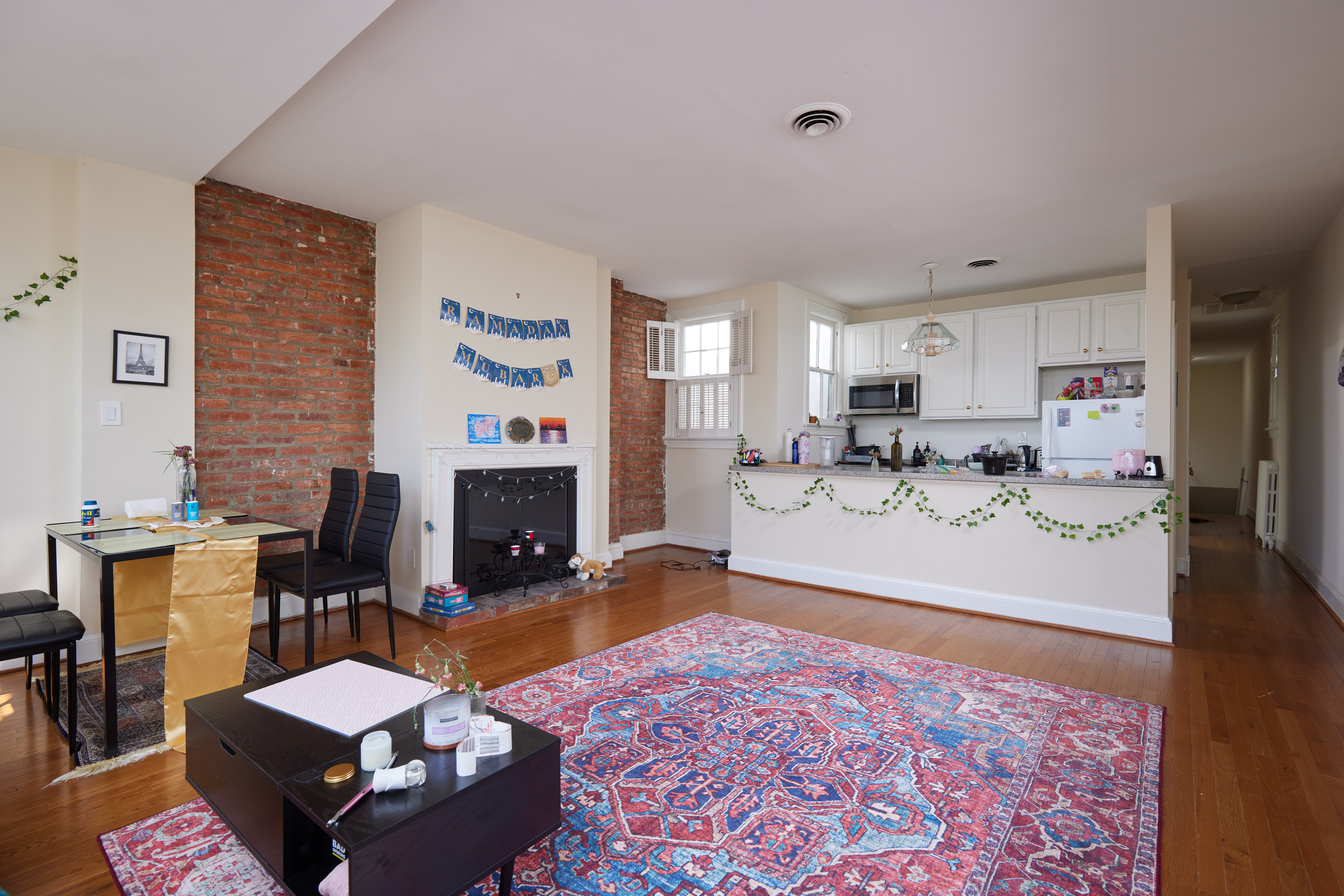 3420 R Street Northwest Washington, DC 20007 - Photo 37 of 53 a living room with furniture and a fireplace