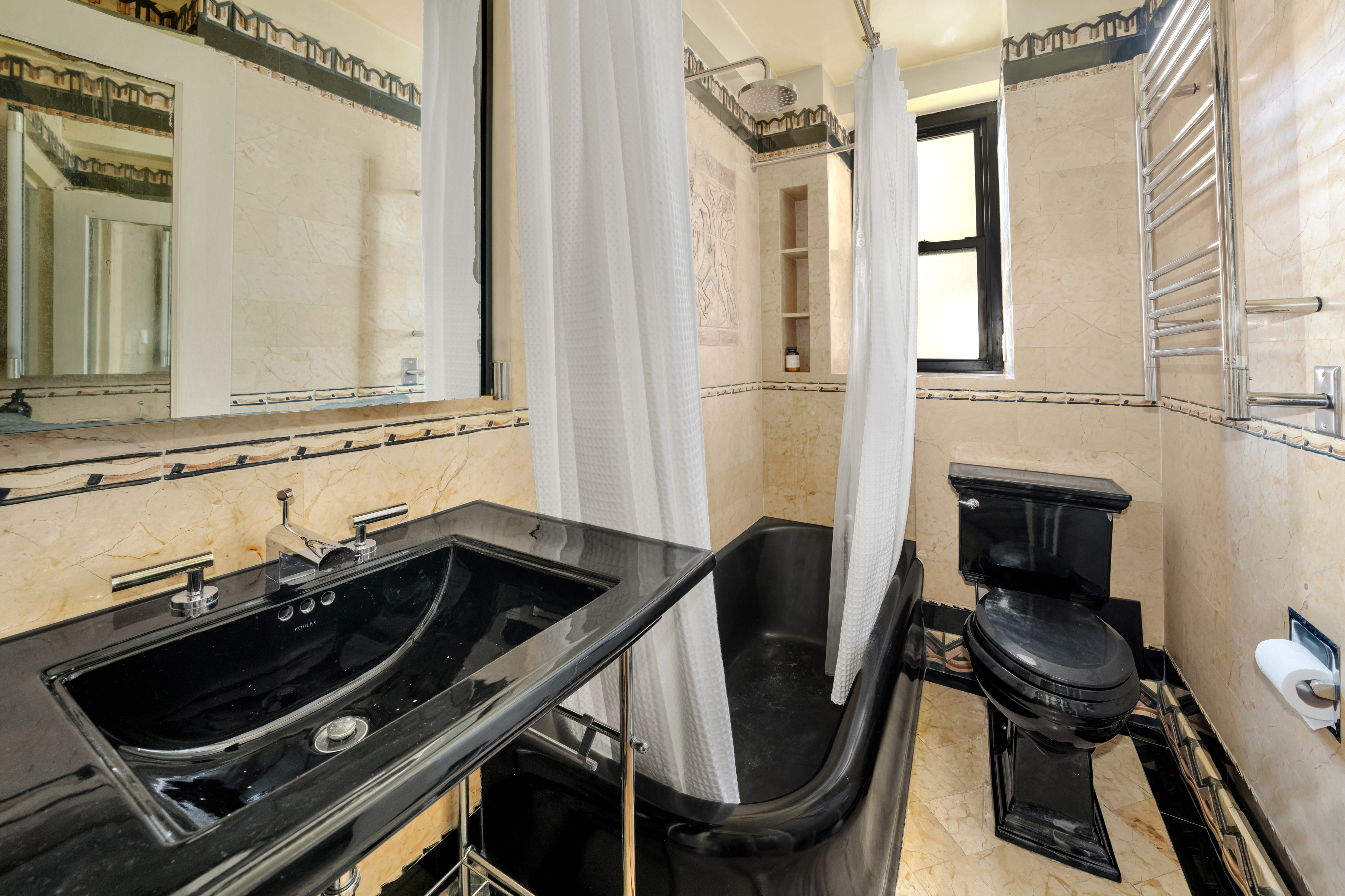 235 East 22nd Street, Unit 15M Manhattan, NY 10010 - Photo 6 of 14 a close view of a sink and a stove