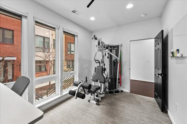 a view of a room with gym equipment