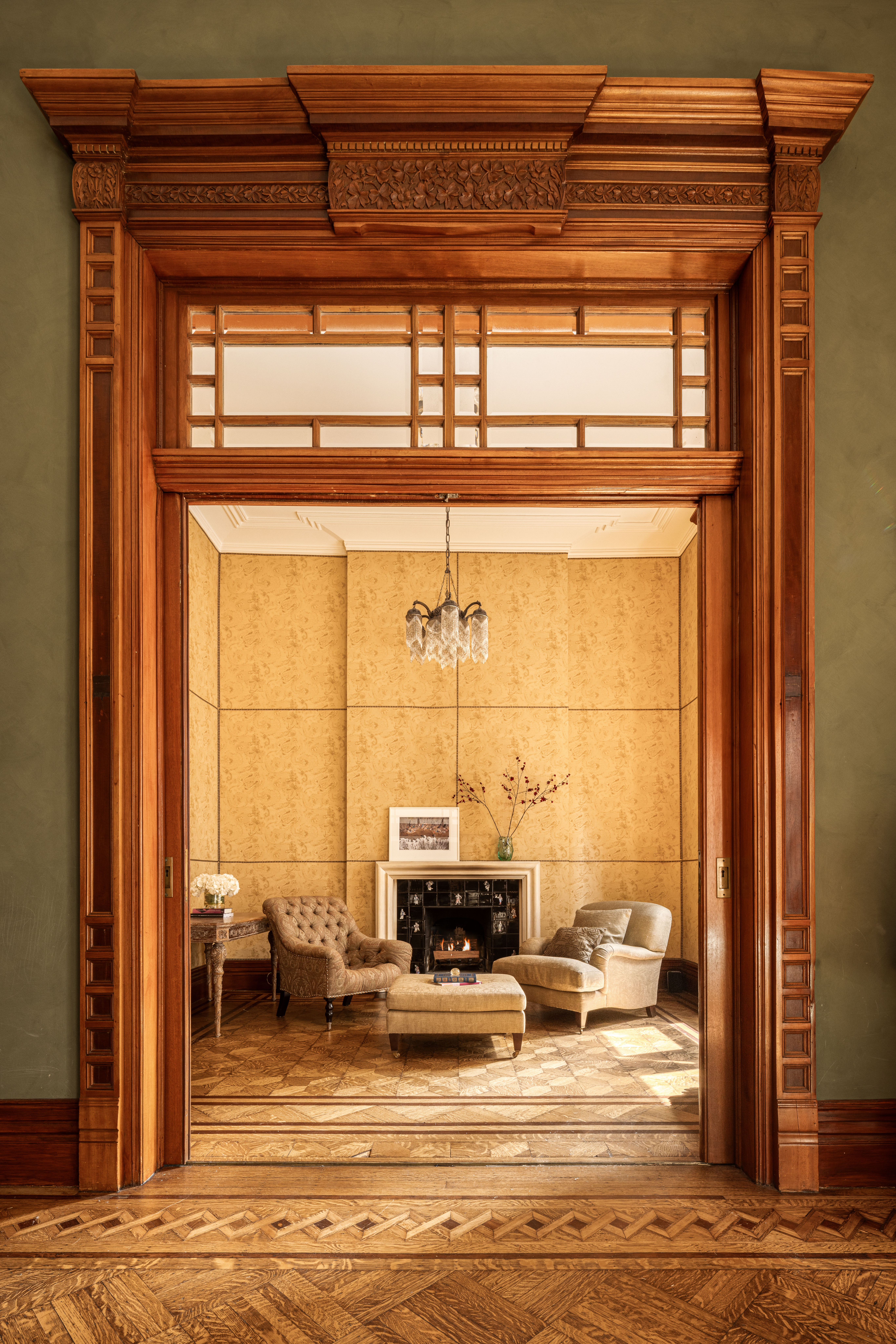 205 West 57th Street, Unit 4B Manhattan, NY 10019 - Photo 4 of 14 a view of a living room with a floor to ceiling window and wooden floor