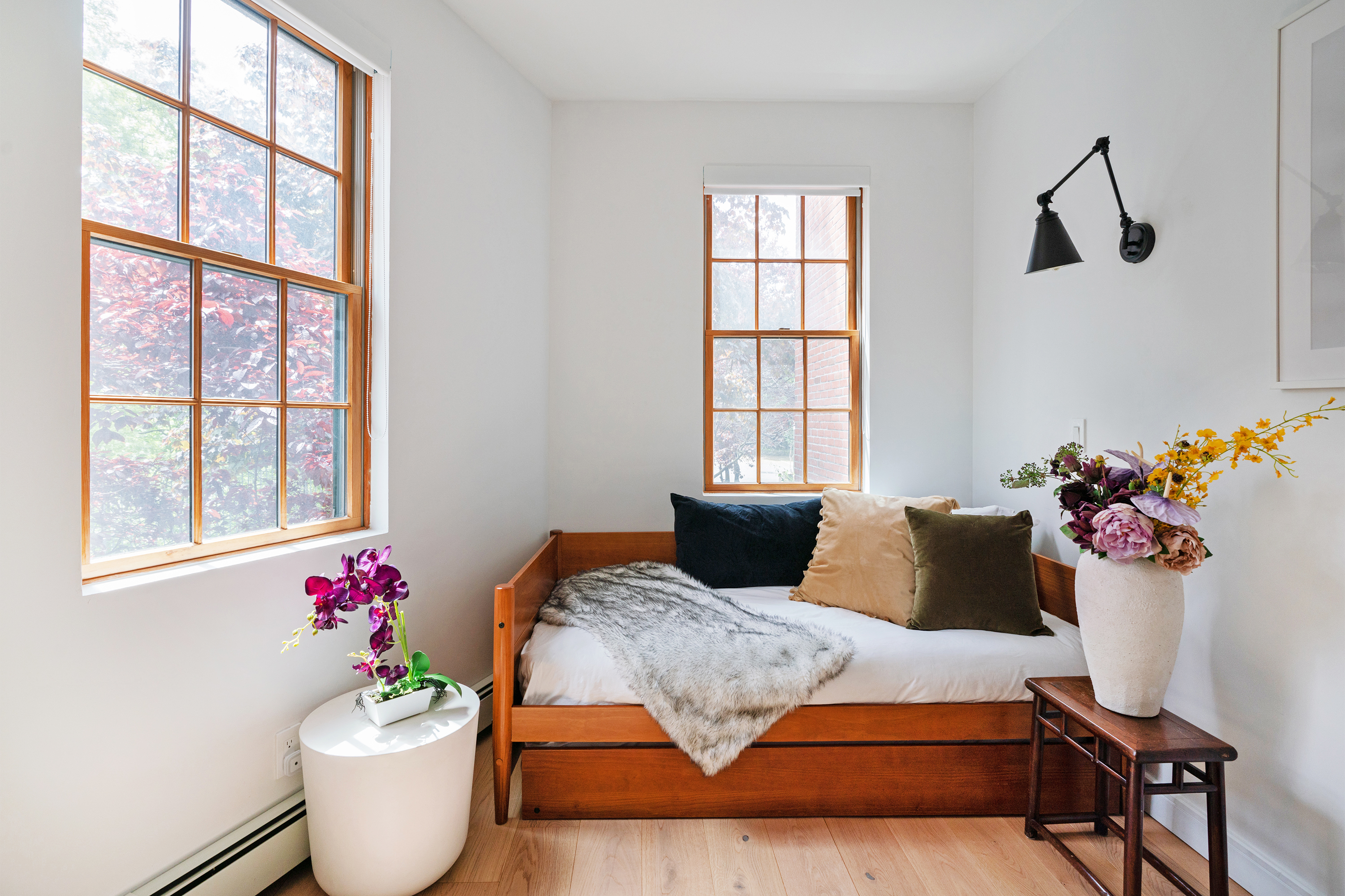 334 Plymouth Street Brooklyn, NY 11201 - Photo 12 of 32 a living room with furniture and flowers