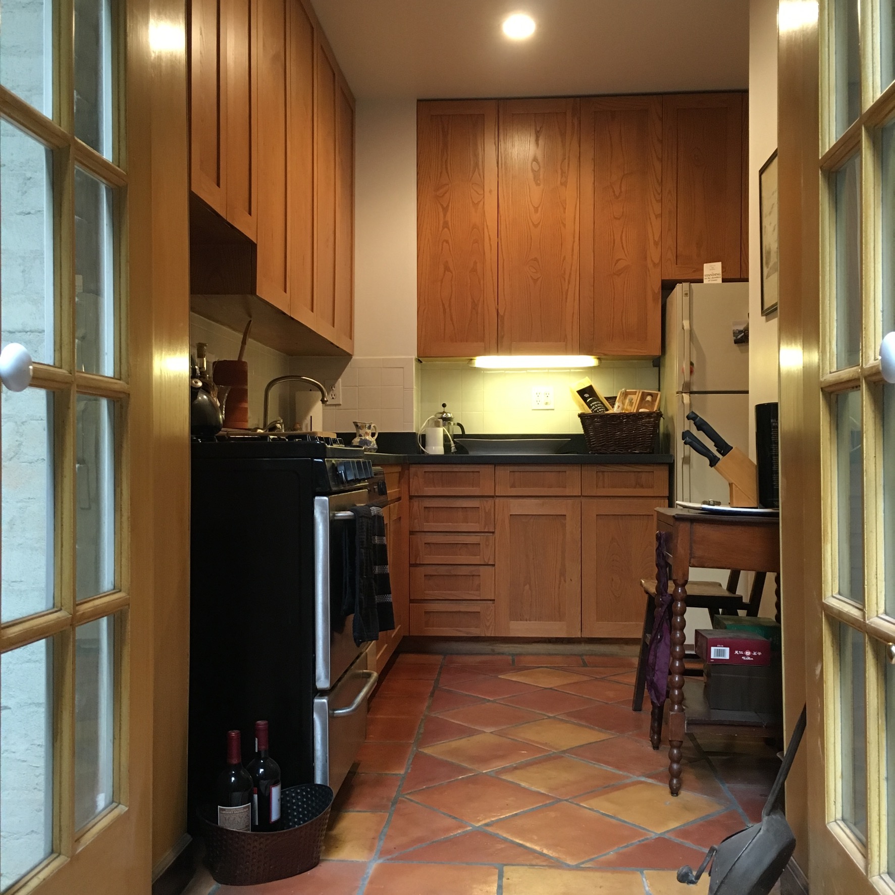323 West 83rd Street, Unit 1C Manhattan, NY 10024 - Photo 7 of 8 a kitchen with a sink and cabinets