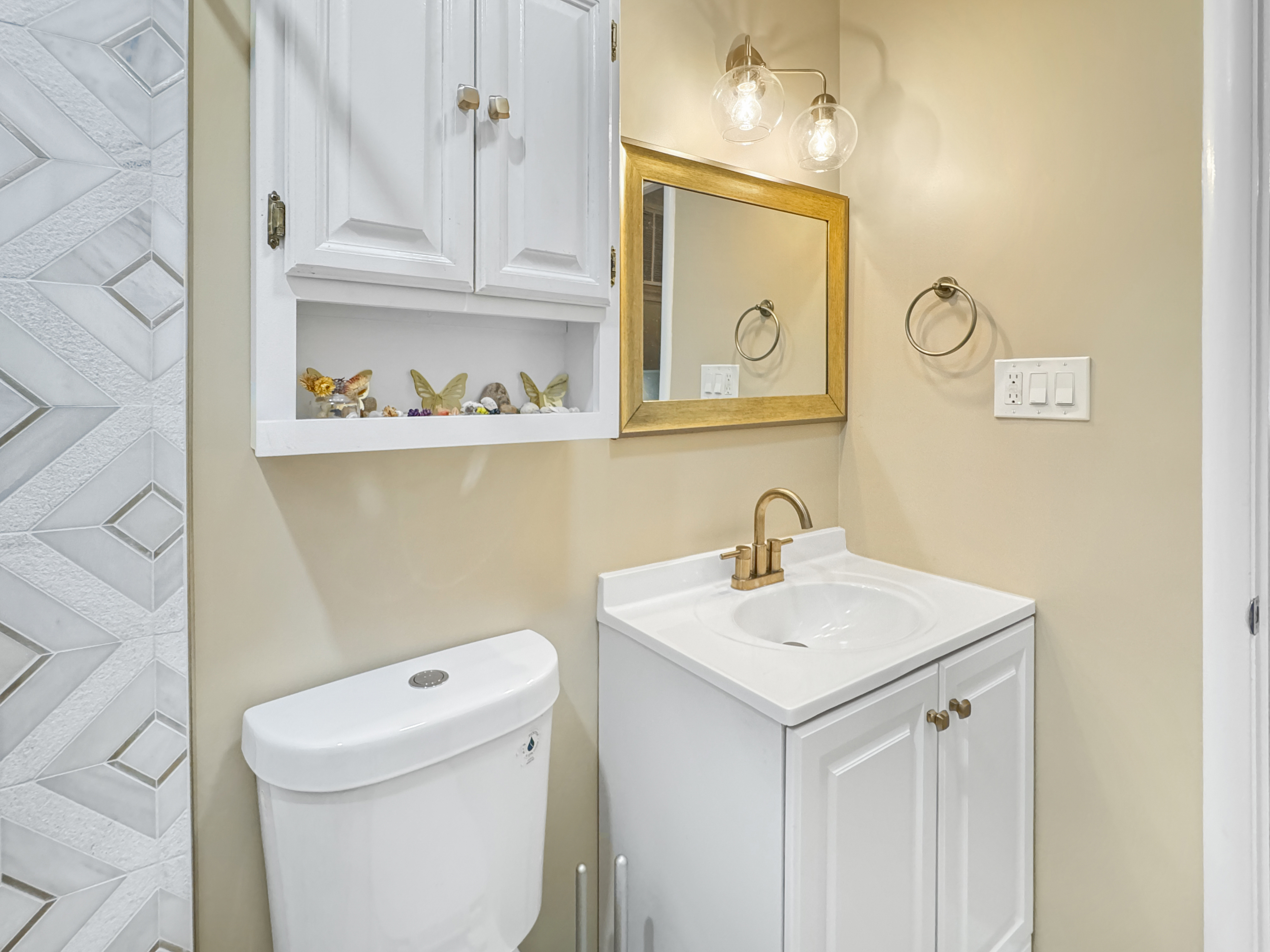 2408 Lillian Drive Silver Spring, MD 20902 - Photo 14 of 40 a bathroom with a sink a toilet and a mirror