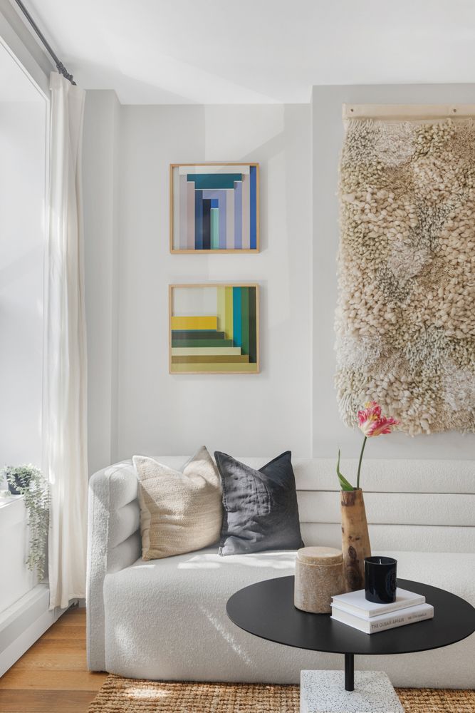 249 Hull Street, Unit C Brooklyn, NY 11233 - Photo 2 of 14 a living room with furniture and a potted plant