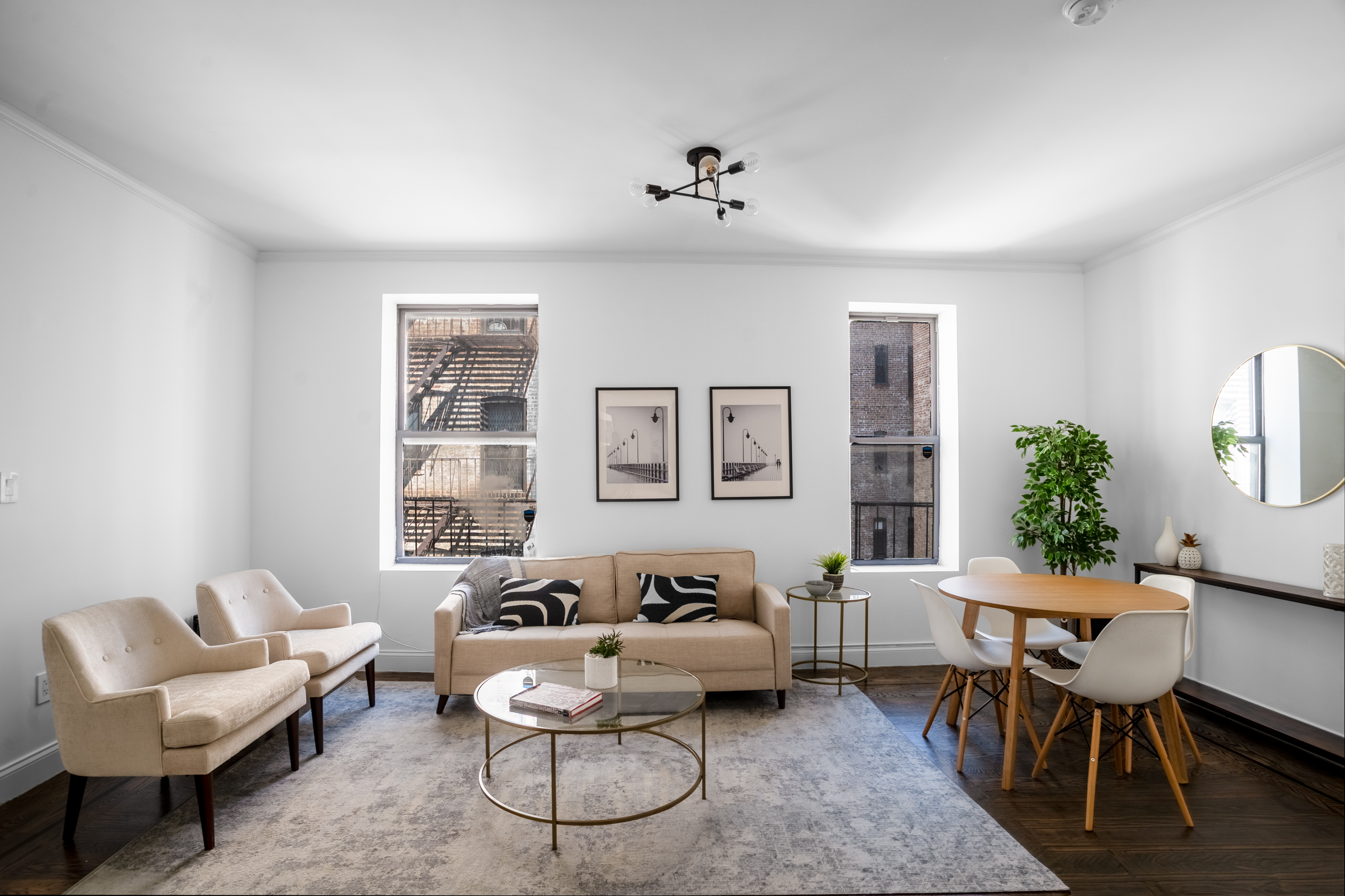 17 East 17th Street, Unit D4 Brooklyn, NY 11226 - Photo 1 of 12 a living room with furniture and a potted plant