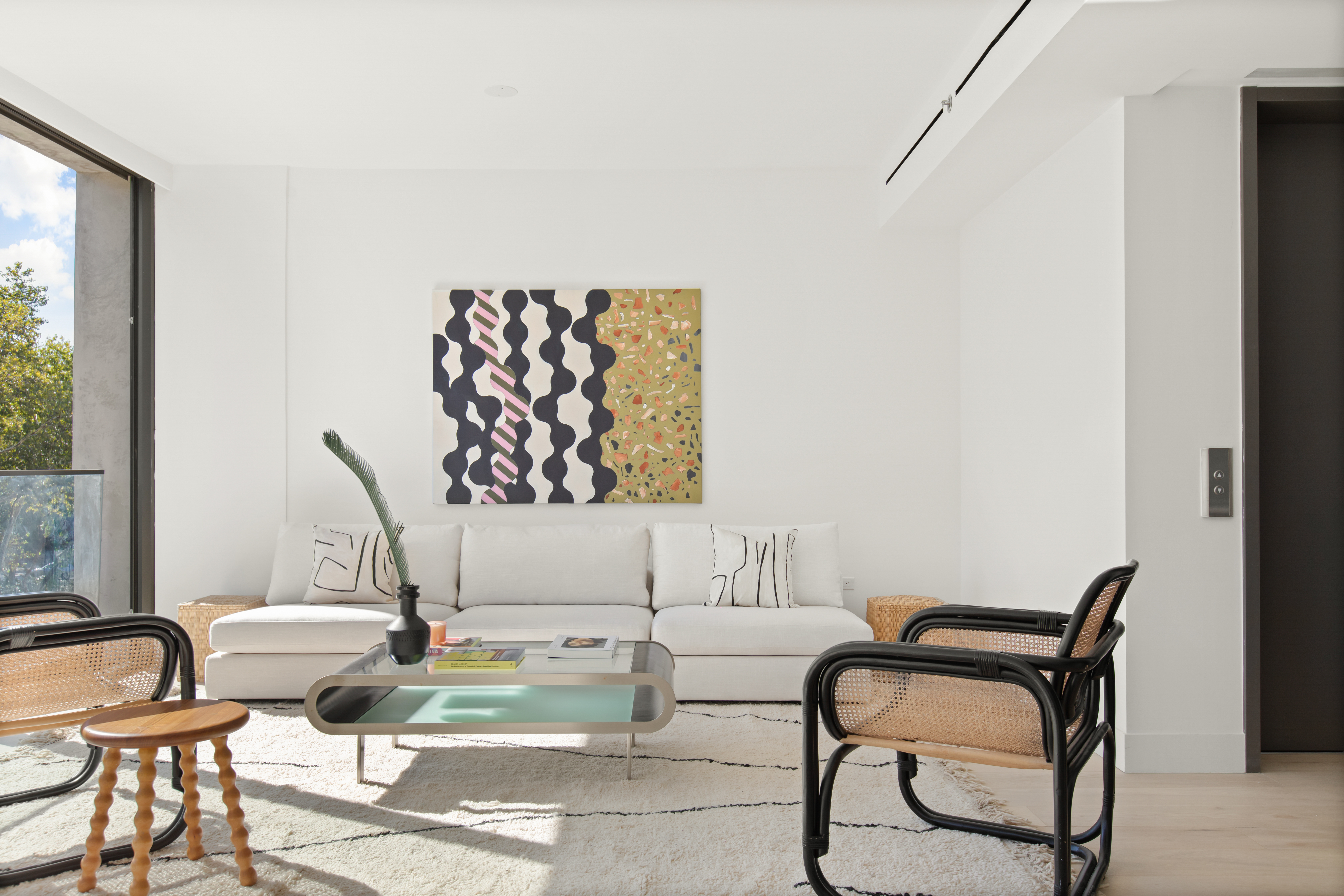 165 Chrystie Street, Unit 3 Manhattan, NY 10002 - Photo 3 of 13 a living room with furniture and a window