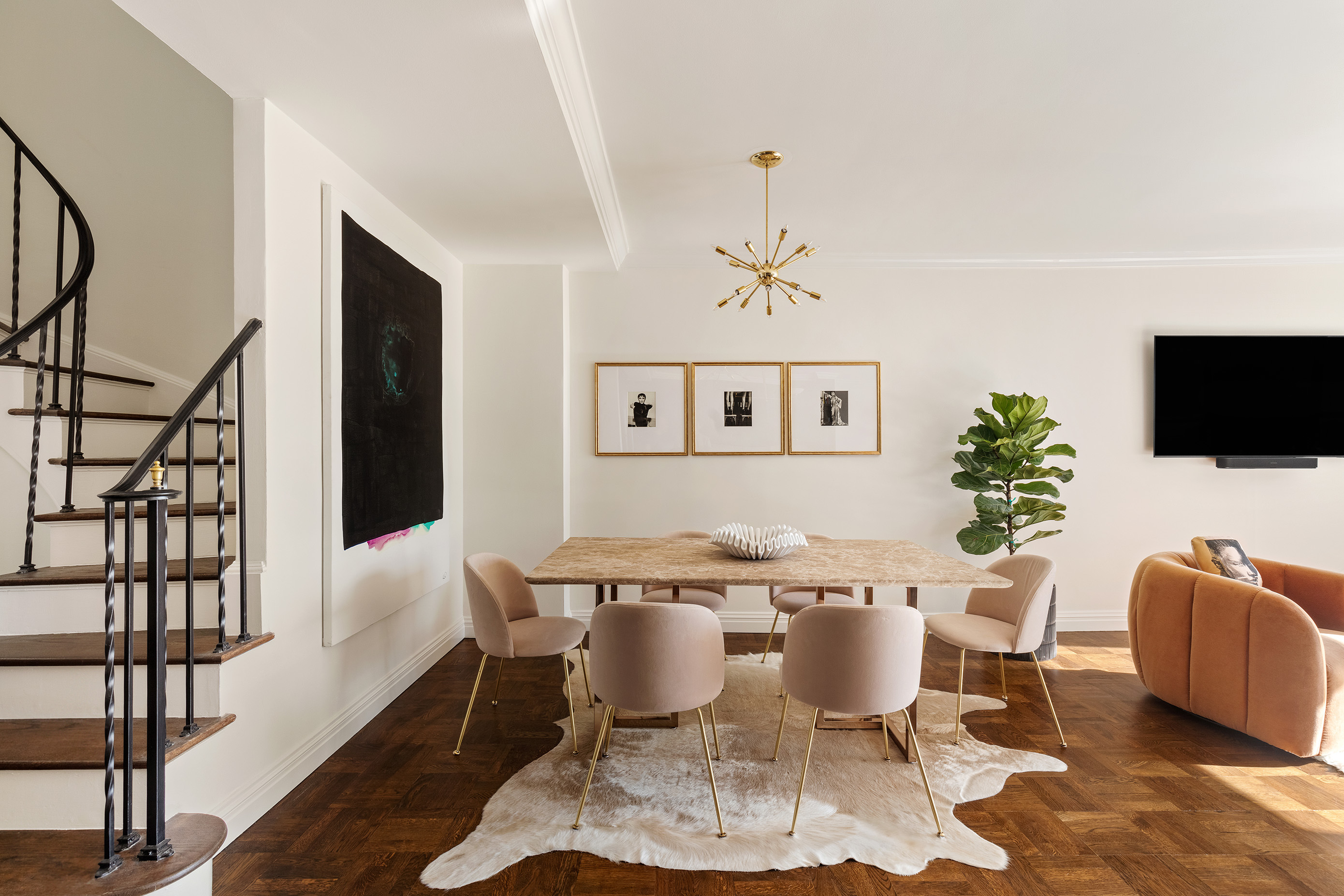 12 Beekman Place, Unit 7/8B Manhattan, NY 10022 - Photo 4 of 17 a dining room with furniture a rug and wooden floor