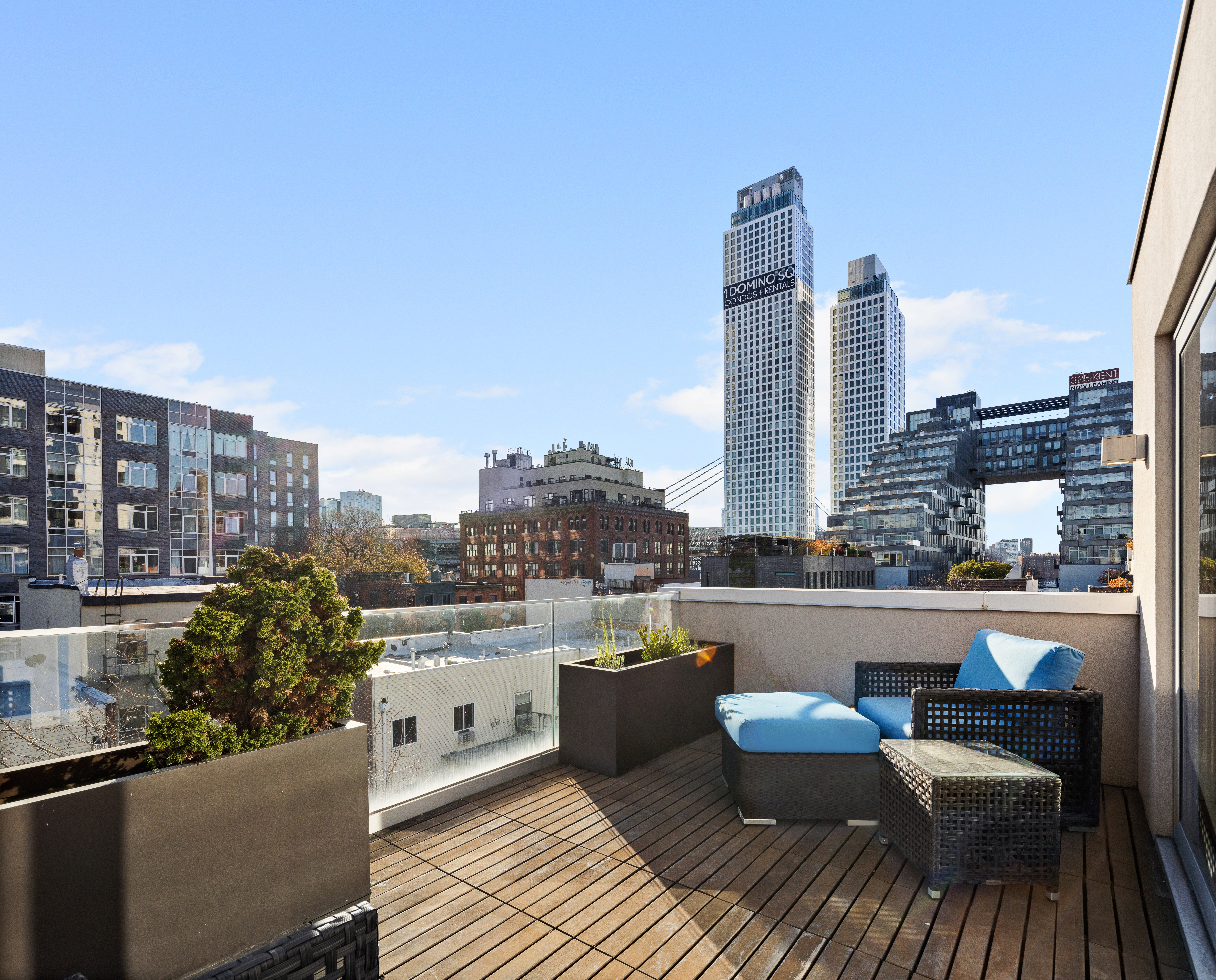 78 South 3rd Street, Unit 3 Brooklyn, NY 11249 - Photo 14 of 17 a view of a balcony with two chairs and a table