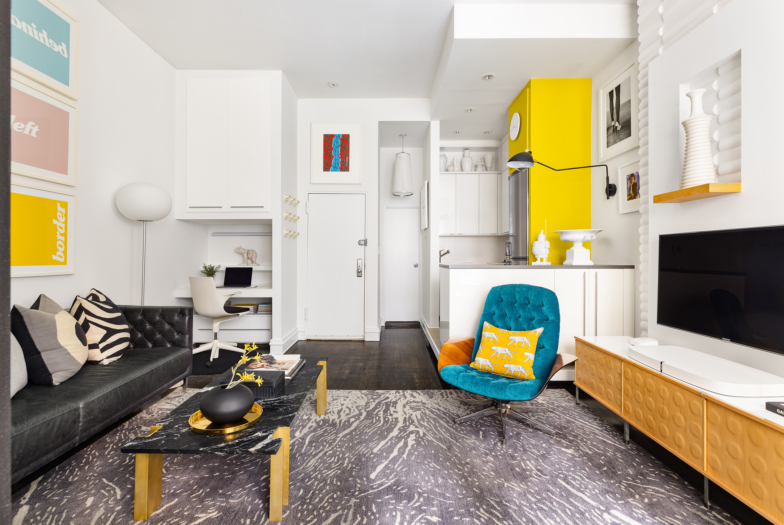 258 West 93rd Street, Unit 2B Manhattan, NY 10025 - Photo 2 of 9 a living room with furniture fireplace and a flat screen tv