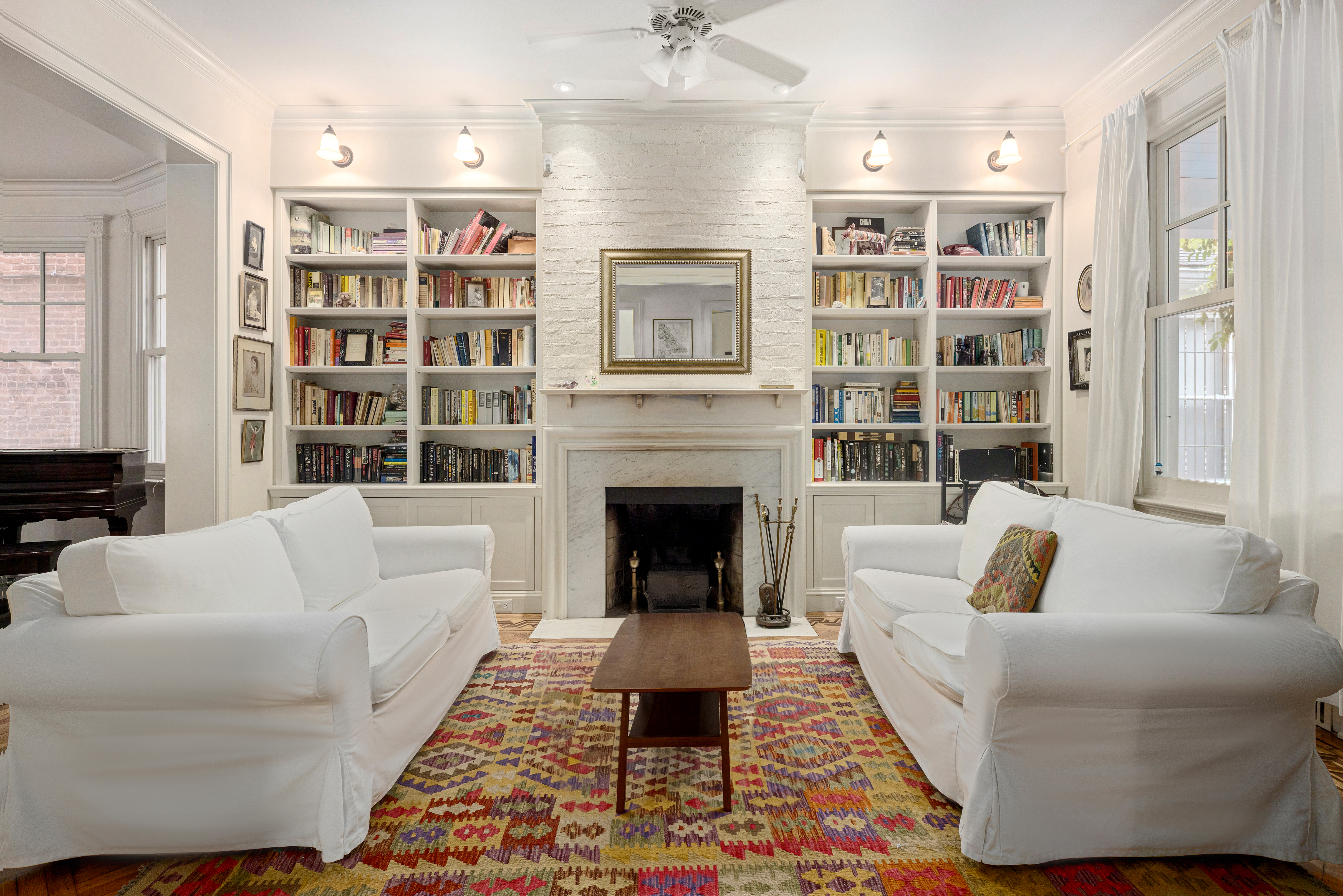 200 Fenimore Street Brooklyn, NY 11225 - Photo 5 of 24 a living room with furniture fireplace and cabinet