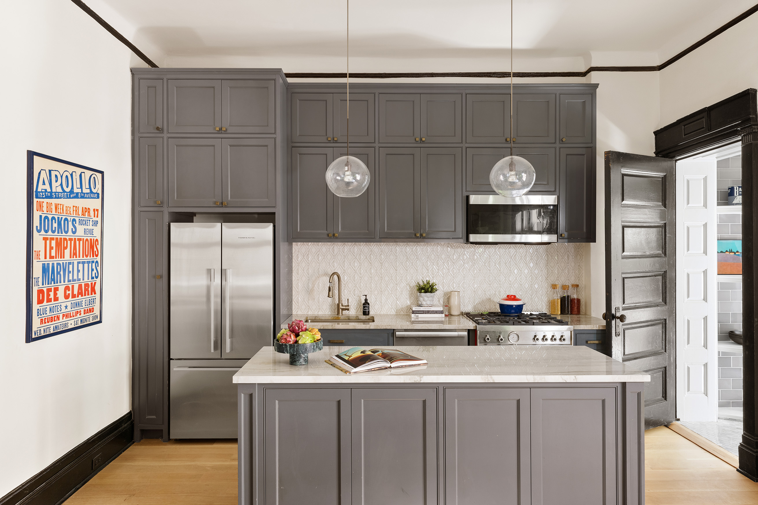 614 West 146th Street, Unit 4FAM Manhattan, NY 10031 - Photo 8 of 18 a kitchen with stainless steel appliances granite countertop a sink and a refrigerator