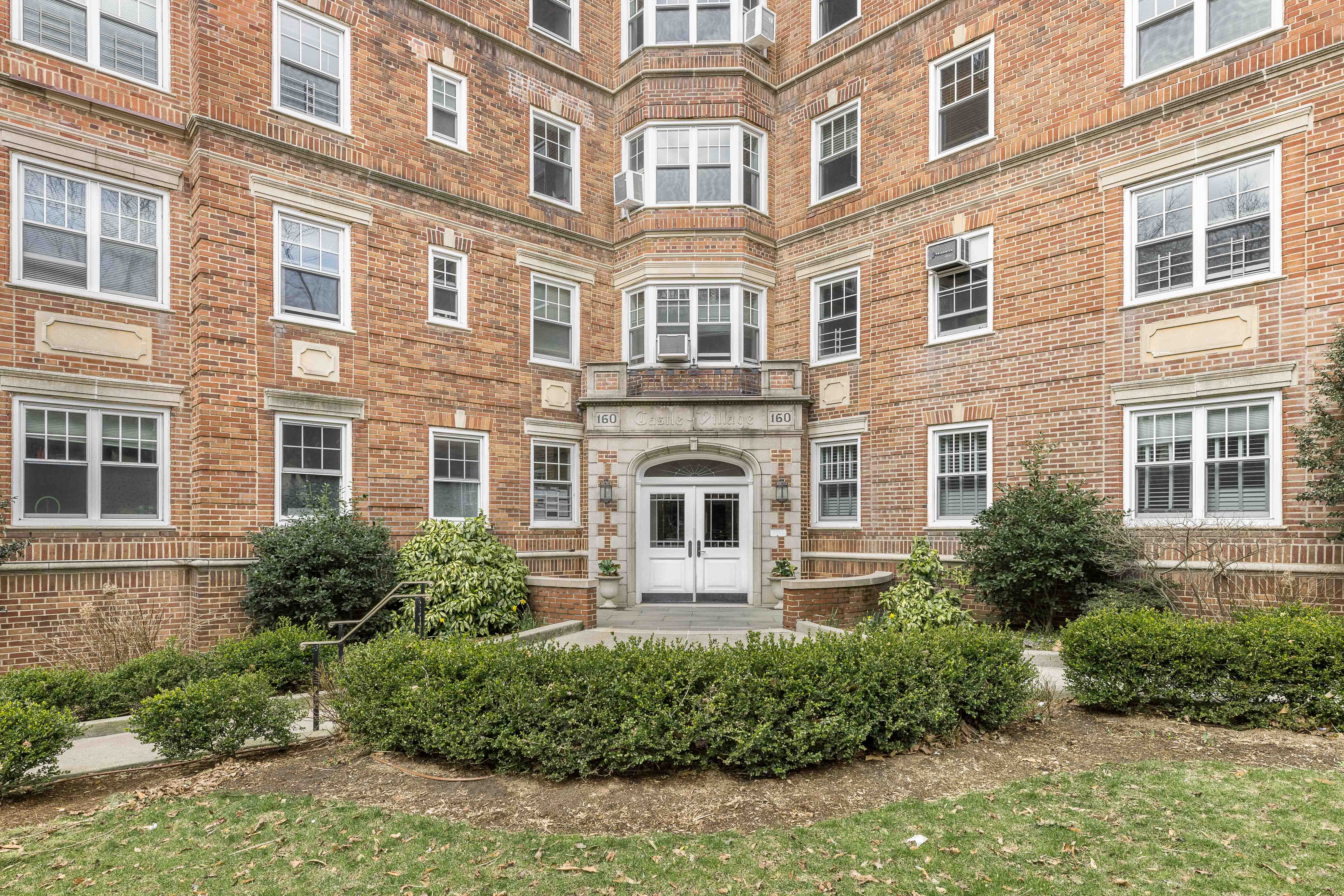 160 Cabrini Boulevard, Unit 89 Manhattan, NY 10033 - Photo 10 of 17 a front view of a house with many windows