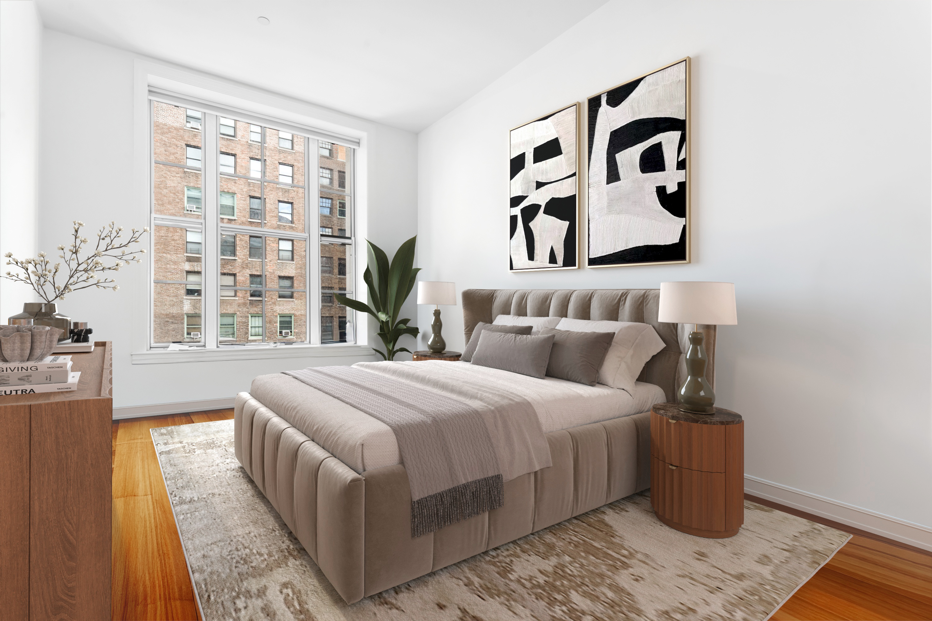 2112 Broadway, Unit 5F Manhattan, NY 10023 - Photo 7 of 9 a bedroom with a bed and wooden floor